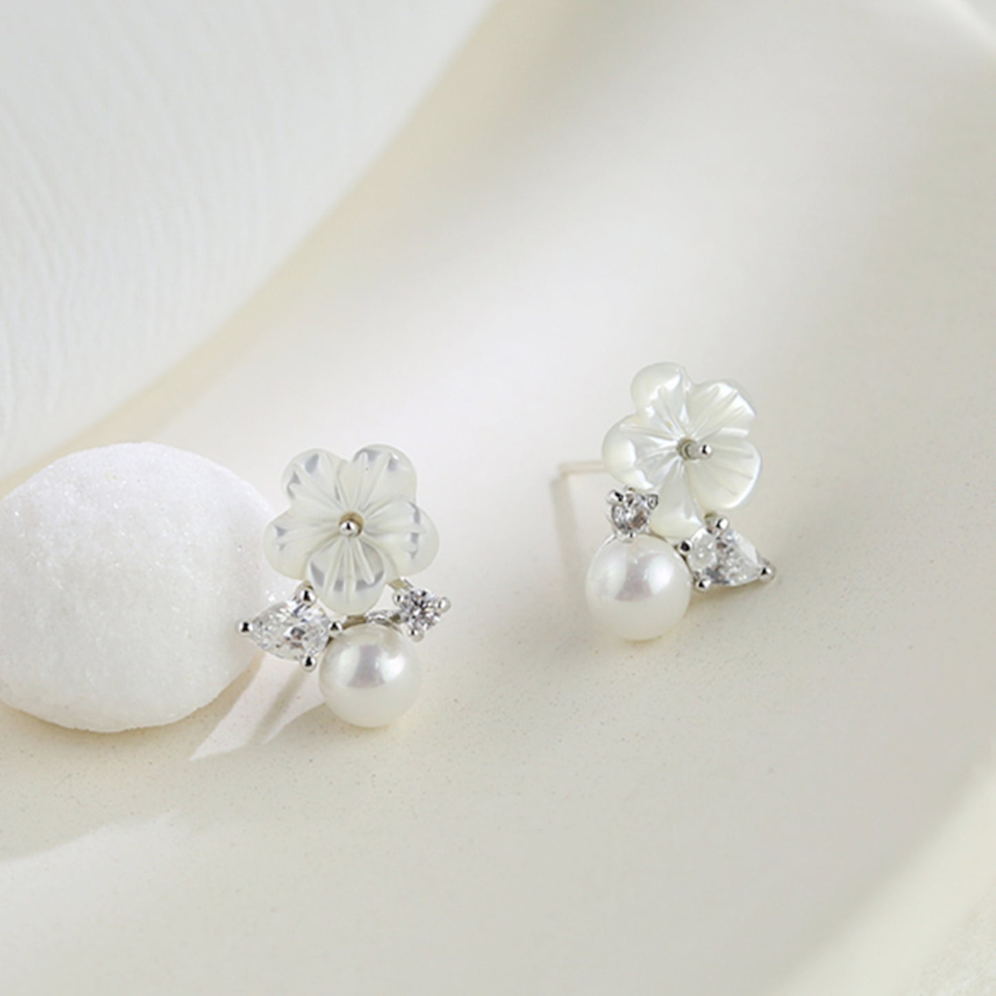 Sterling Silver Mother of Pearl Earrings with CZ Leaf and Dainty Pearl Follower - sugarkittenlondon