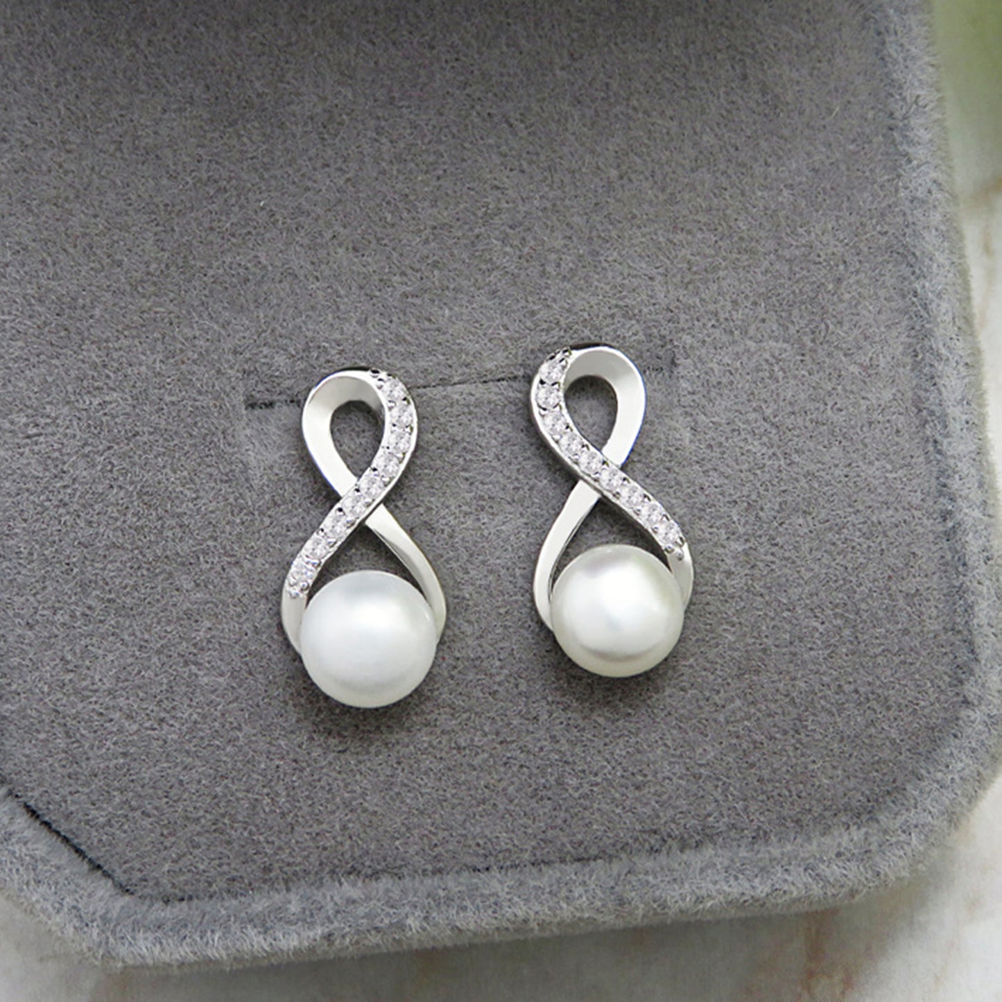 Sterling Silver Infinity Knot Natural Freshwater Pearl Stud Earrings - sugarkittenlondon