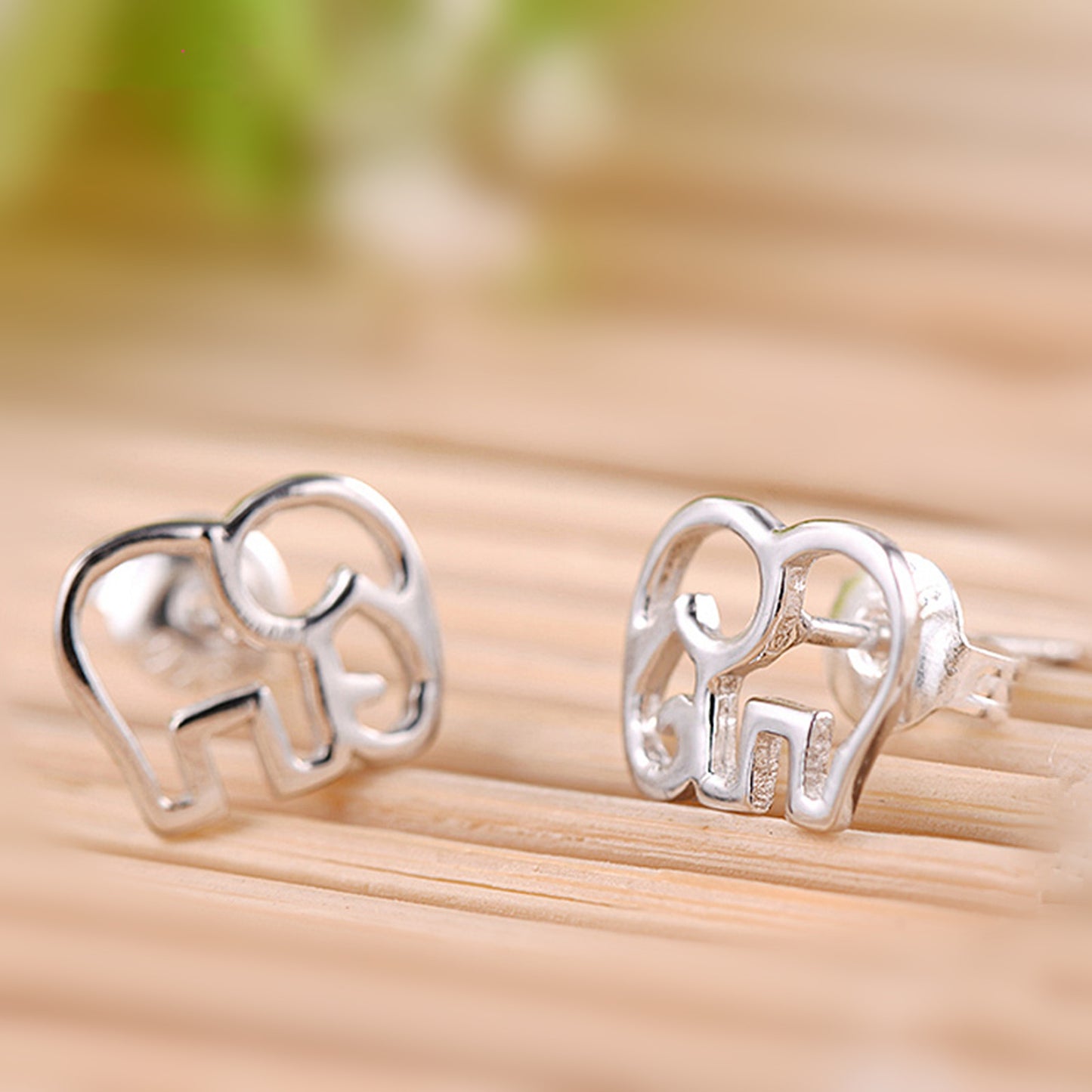 Rhodium on Sterling Silver Hollow Out Elephant Stud Earrings - sugarkittenlondon