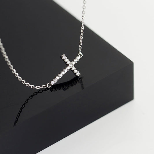 Sideways cross CZ necklace on chain with sideways cross pendant and bright crystal details