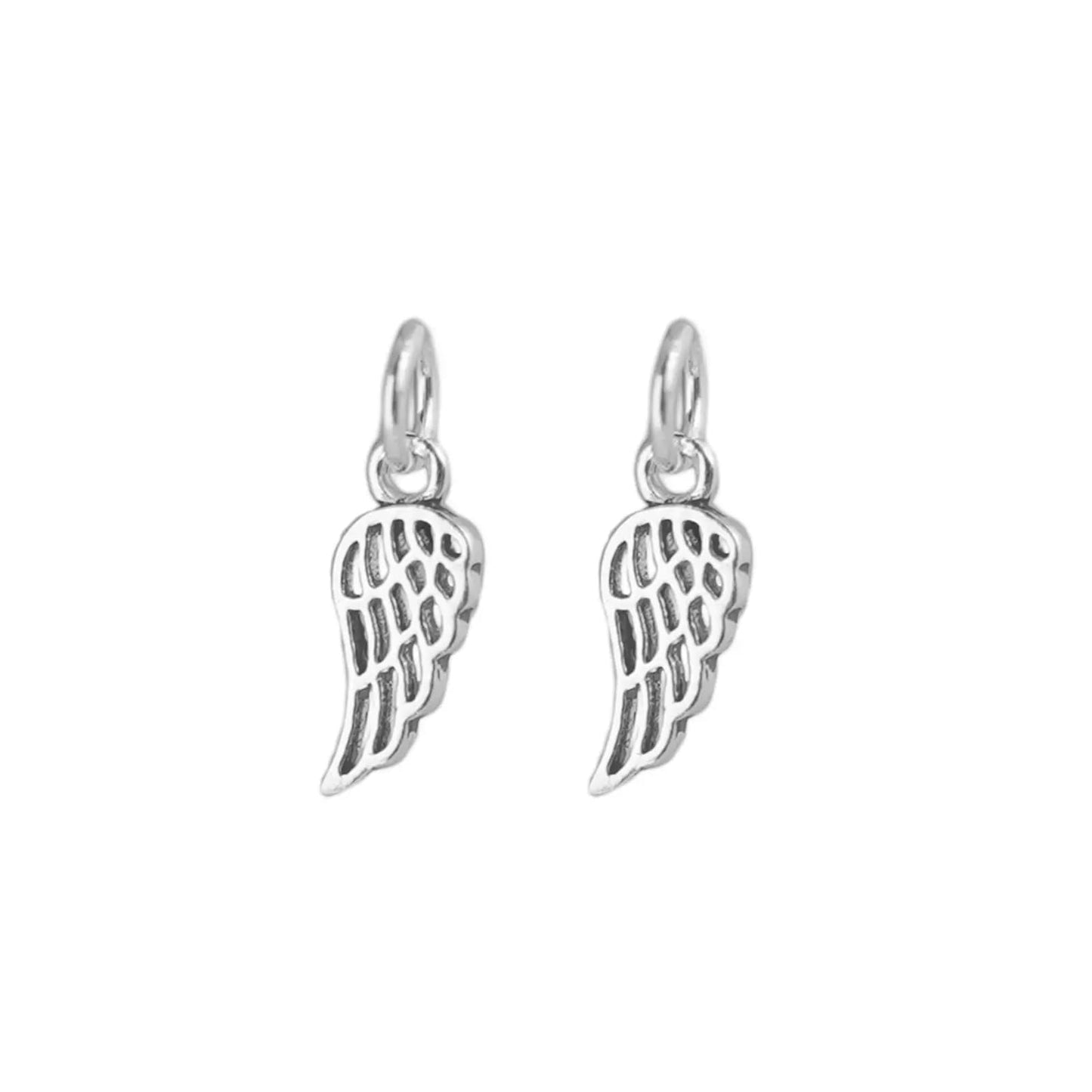 Silver feather wing charm with loop bail, textured feather wing shape