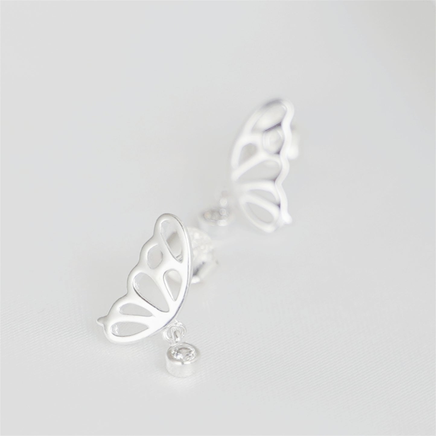 Sterling Silver Hollow Butterfly Wing Bezel CZ Drop Dangle Stud Earrings - sugarkittenlondon