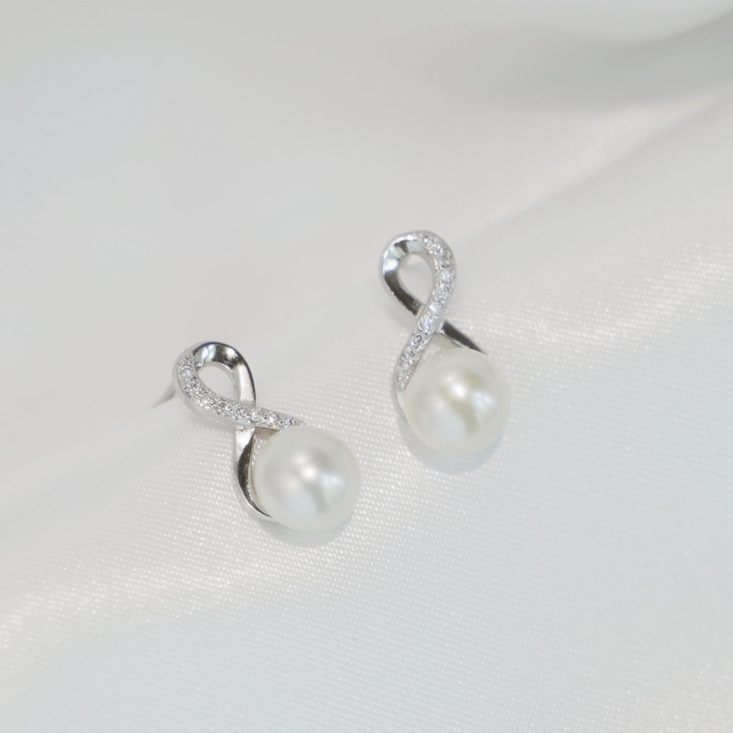Sterling Silver Infinity Knot Natural Freshwater Pearl Stud Earrings - sugarkittenlondon
