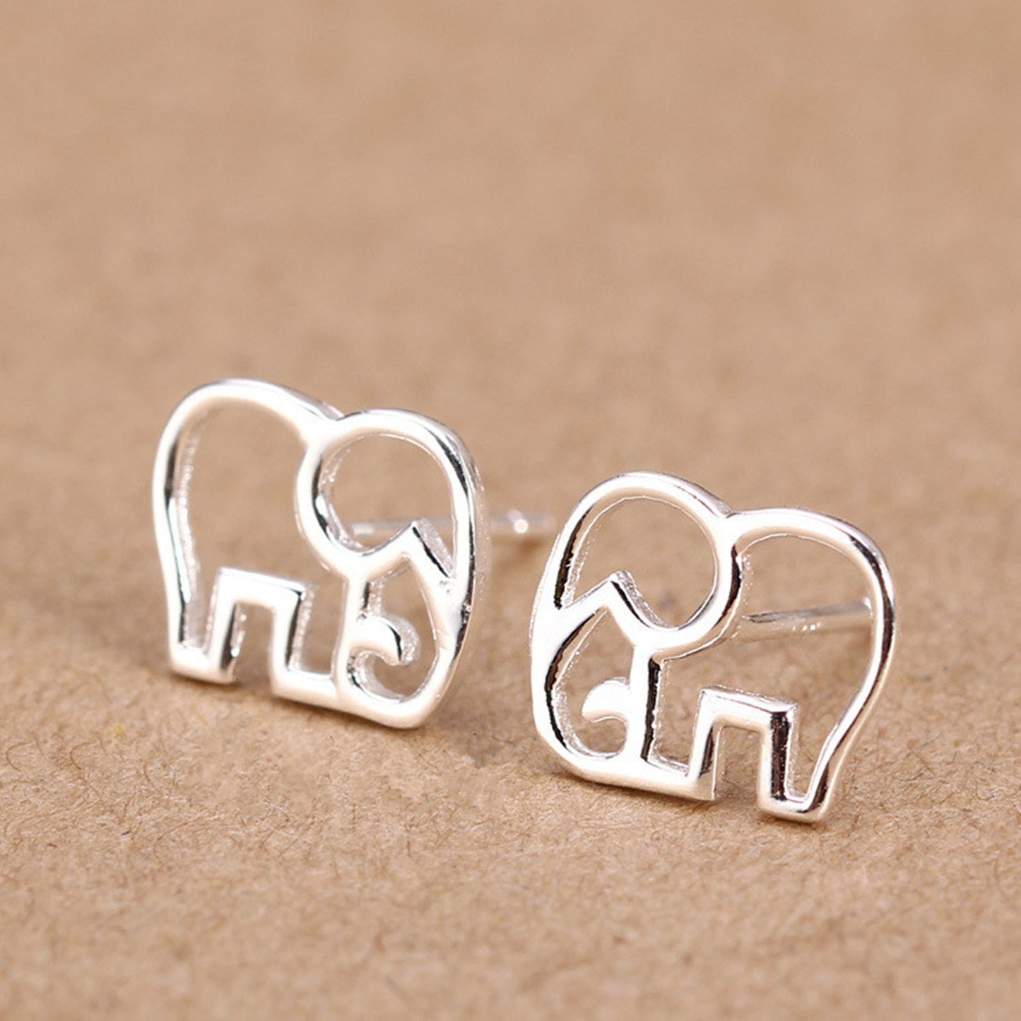 Rhodium on Sterling Silver Hollow Out Elephant Stud Earrings - sugarkittenlondon