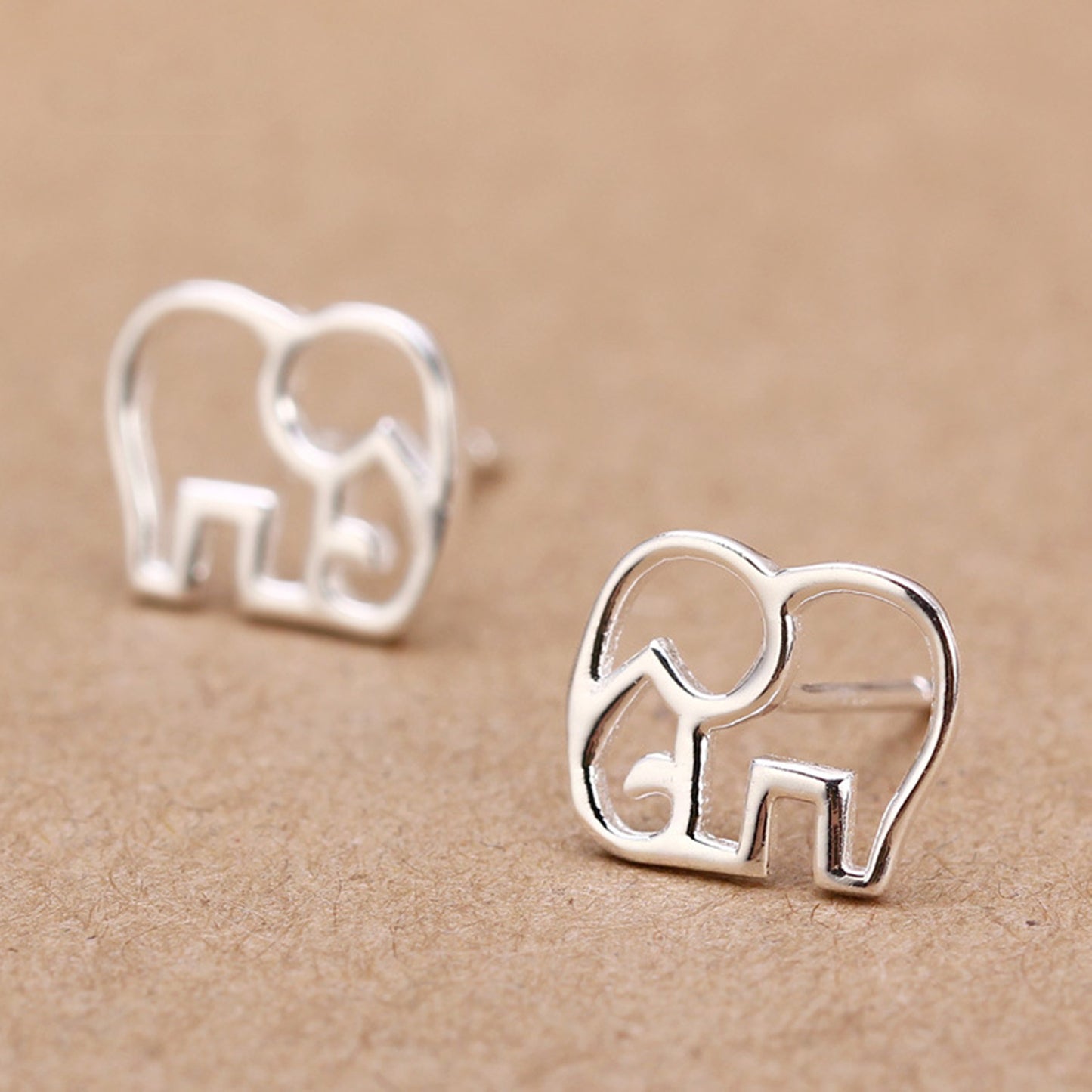 Rhodium on Sterling Silver Hollow Out Elephant Stud Earrings - sugarkittenlondon