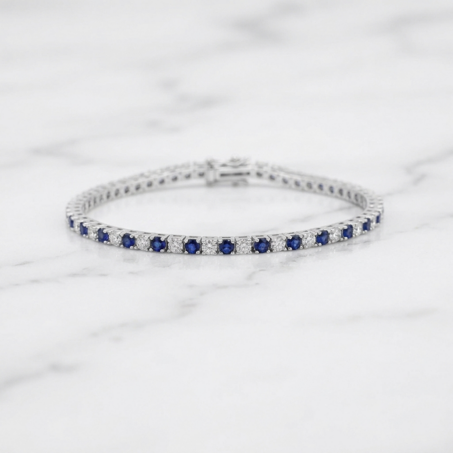 Sapphire tennis bracelet side view with continuous row of blue stones