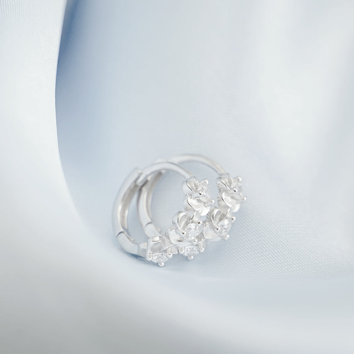 Rhodium on Sterling Silver Triple Camellia Blossom CZ Huggie Hoop Earrings - sugarkittenlondon