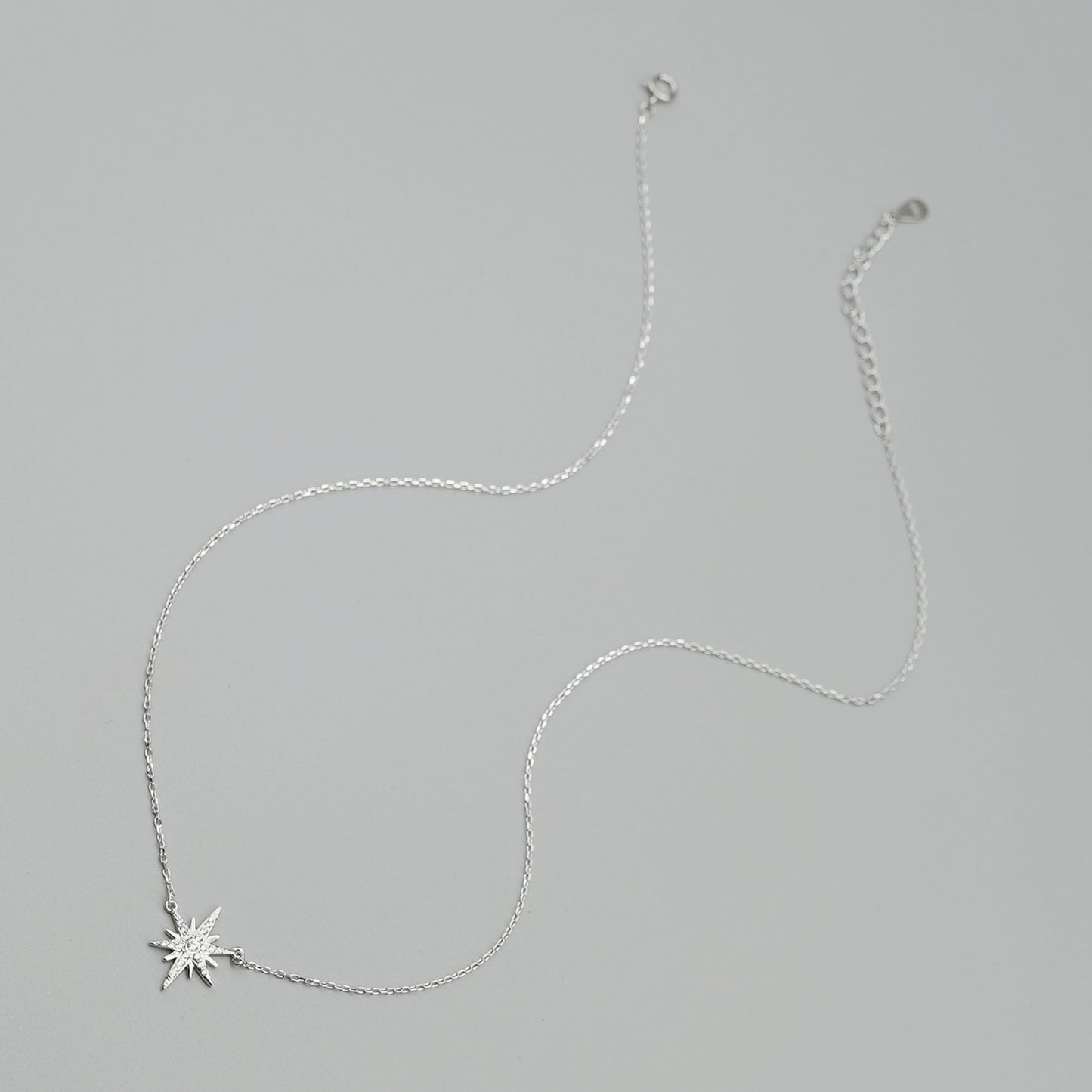 Rhodium on Sterling Silver Sunlight Star Sunburst Paved CZ Charm Necklace - sugarkittenlondon