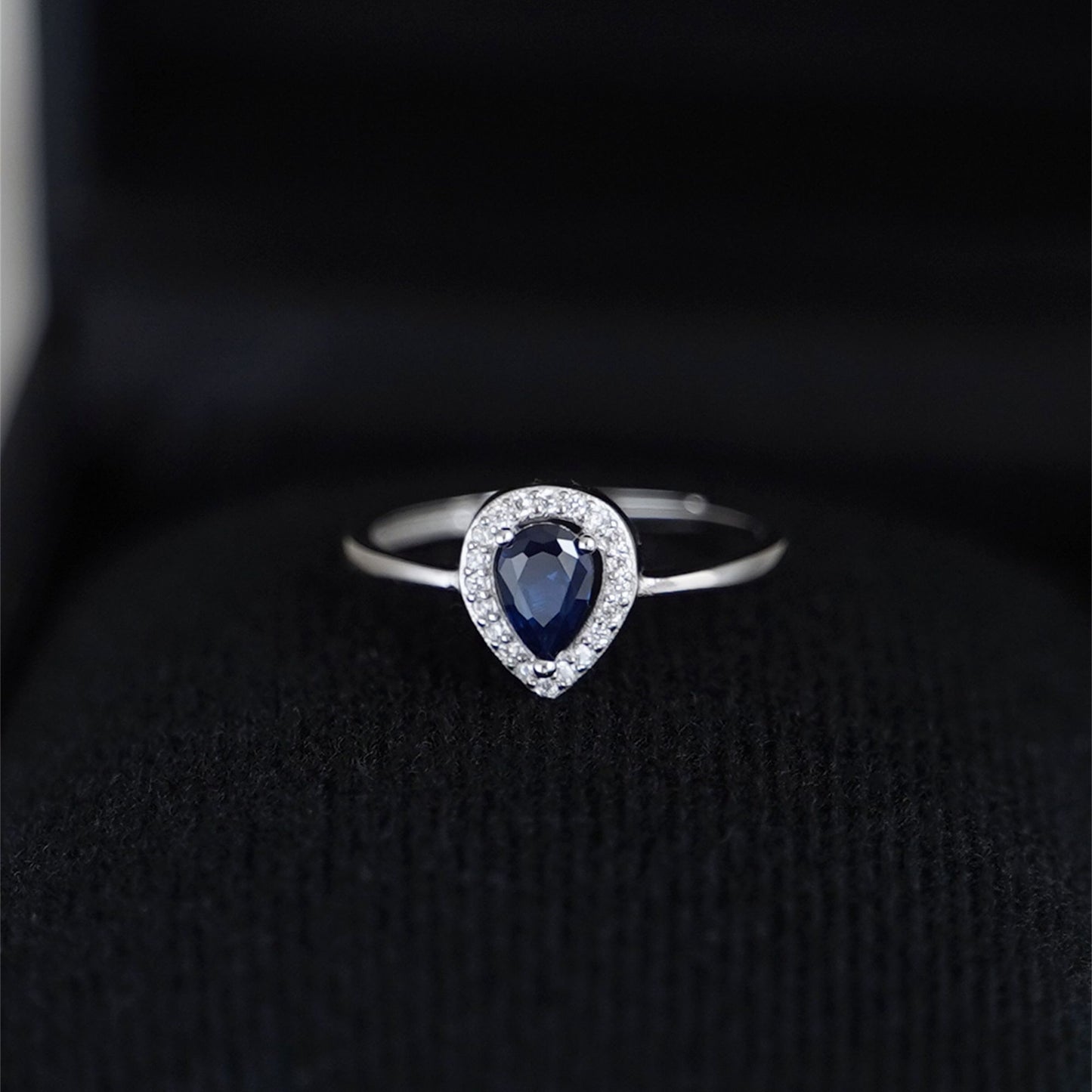 Rhodium on Sterling Silver Teardrop Cut Blue Sapphire Paved CZ Halo Sizable Ring - sugarkittenlondon