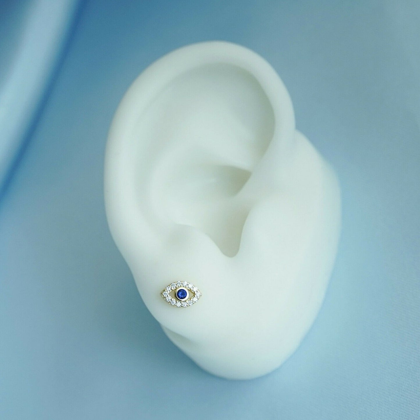 Sterling Silver Evil Eye Stud Earrings with 14K Gold Plating and Blue and White CZ