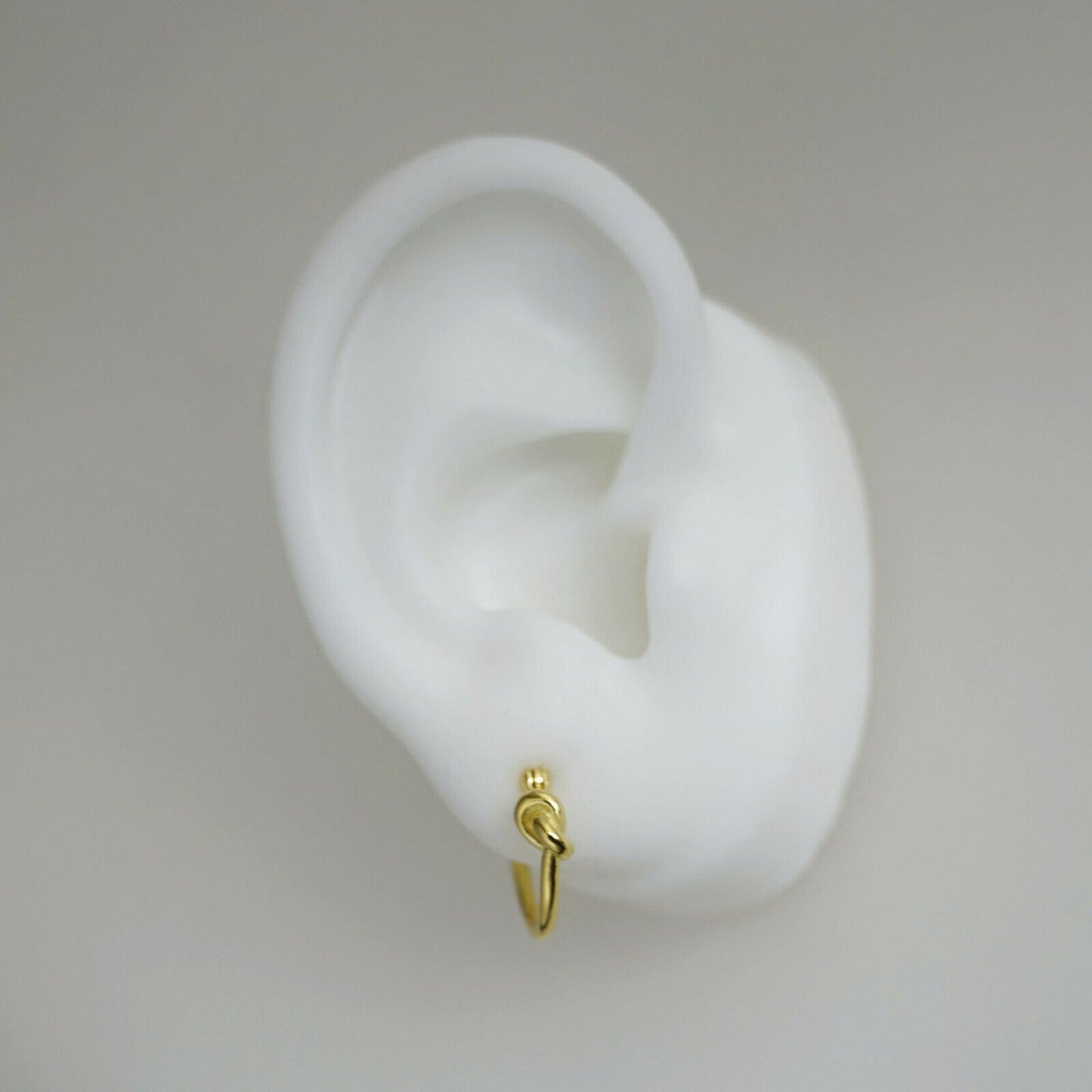 Sterling Silver Creole Hoop Earrings with Gold-plated Love Knot and French Lock