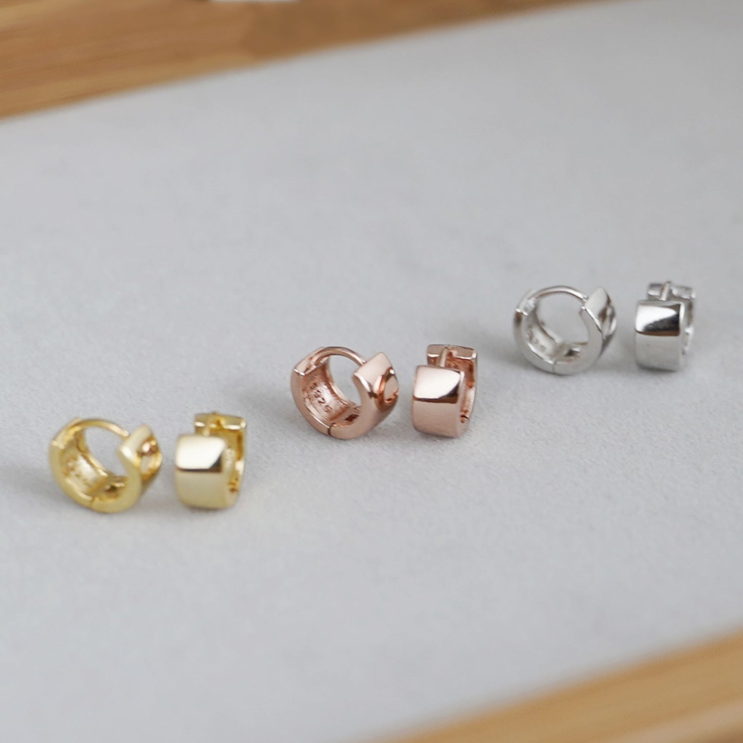 6.5mm Sterling Silver Hoop Huggie Earrings in Gold & Silver.