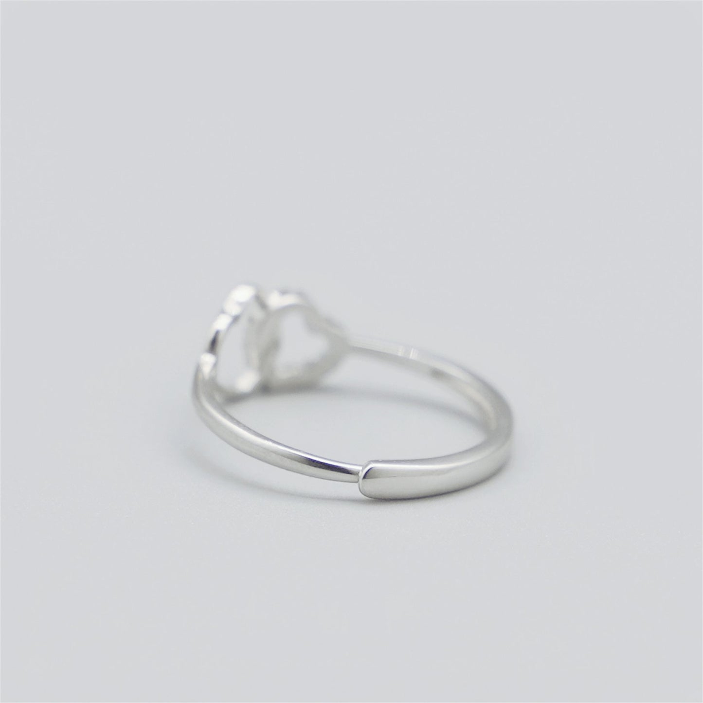 Rhodium Love Ring with Sterling Silver Linked Hearts and Crystal CZ Paving