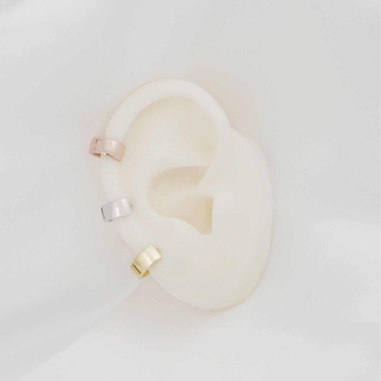6.5mm Sterling Silver Hoop Huggie Earrings in Gold & Silver.