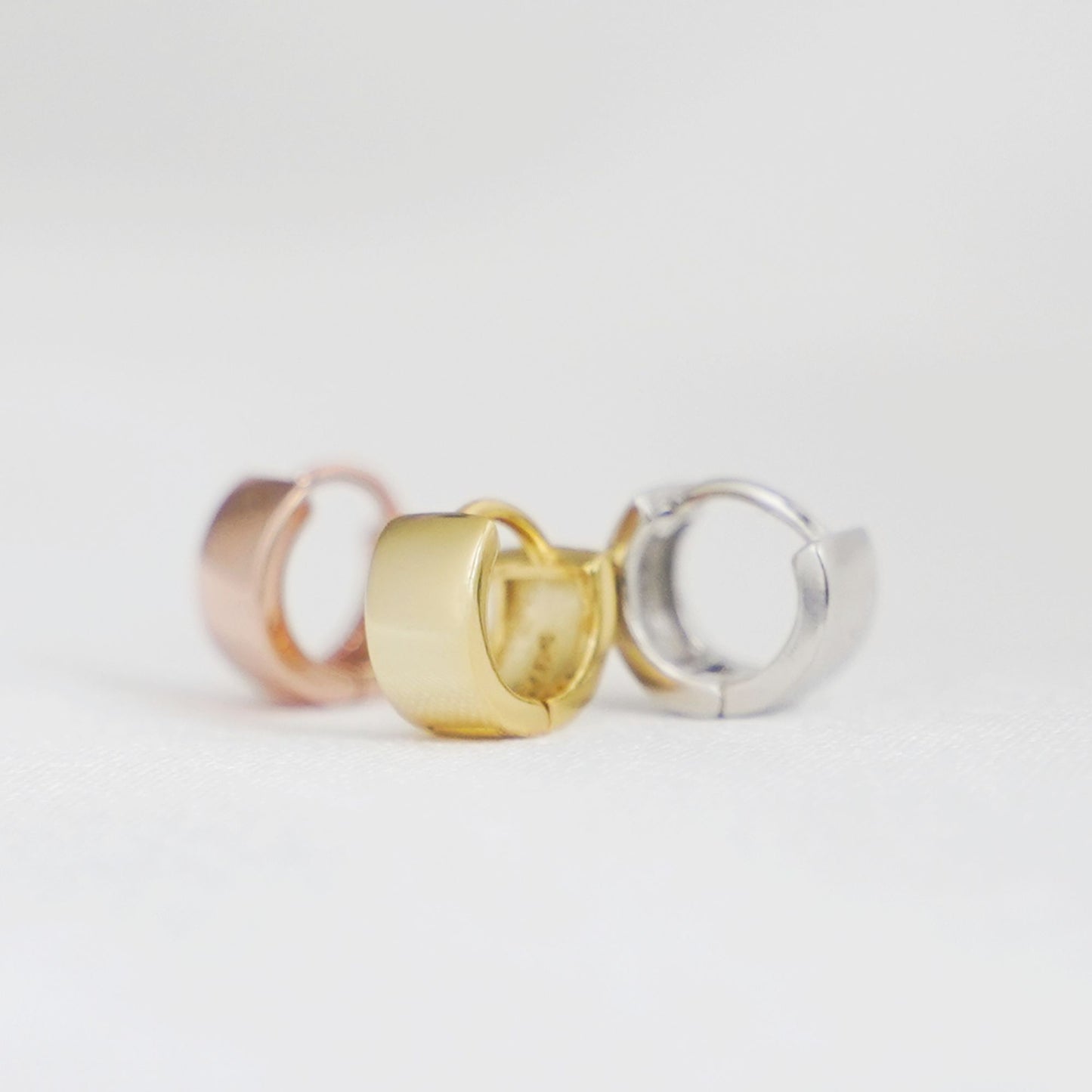 6.5mm Sterling Silver Hoop Huggie Earrings in Gold & Silver.