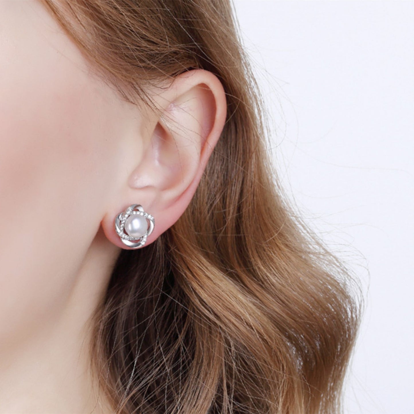 Sterling Silver Freshwater Pearl Stud Earrings with CZ Knots - 7mm White Button Pearls - sugarkittenlondon