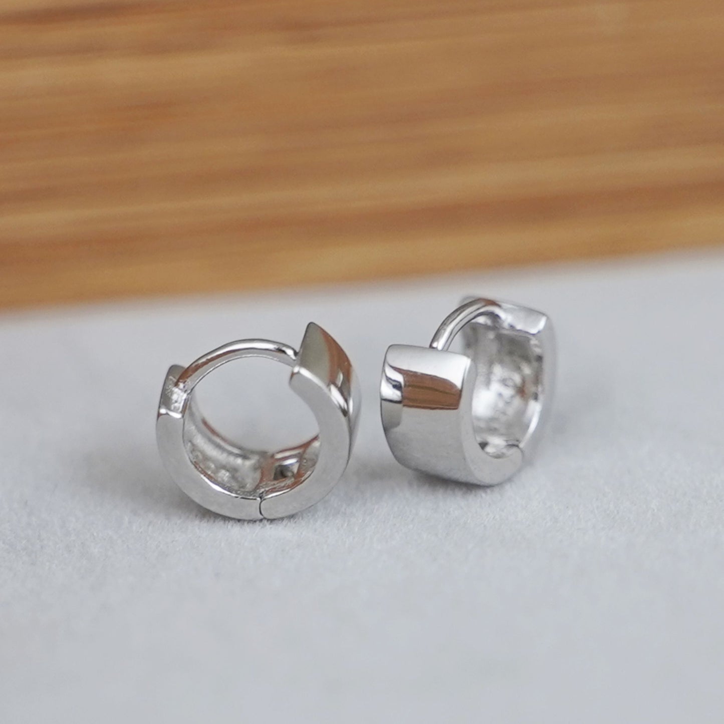 6.5mm Sterling Silver Hoop Huggie Earrings in Gold & Silver.