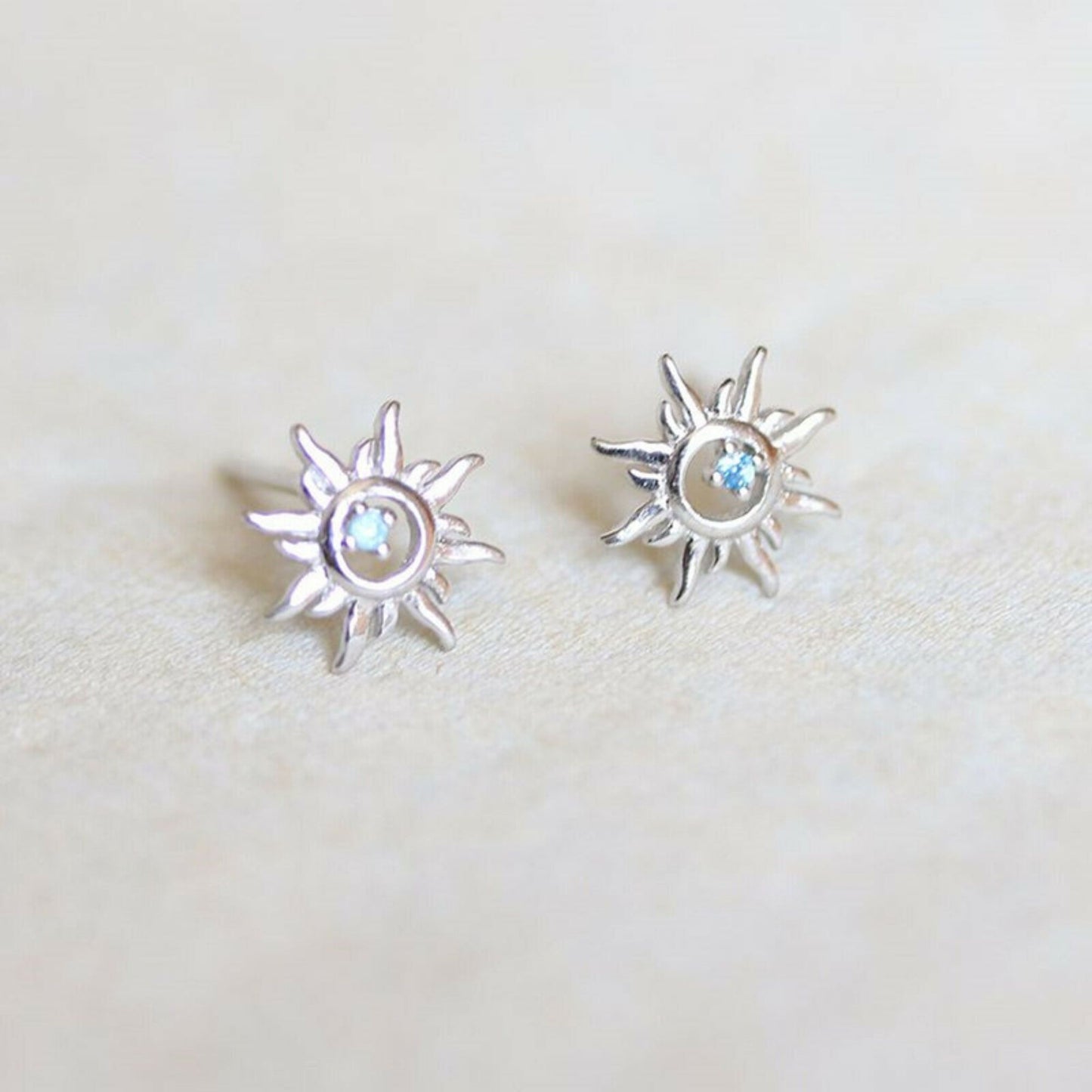 Sparkling Sun Earrings with Light Blue Aquamarine CZ in 925 Sterling Silver