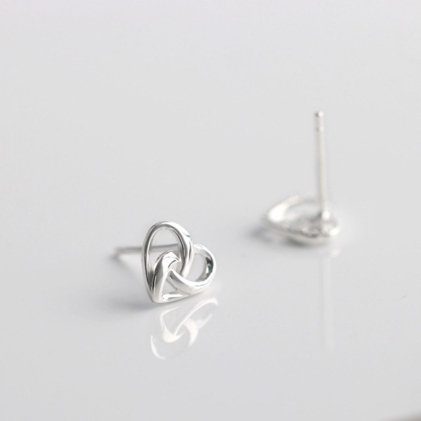 Sterling Silver Twisted Love Knot Heart Stud Earrings - sugarkittenlondon