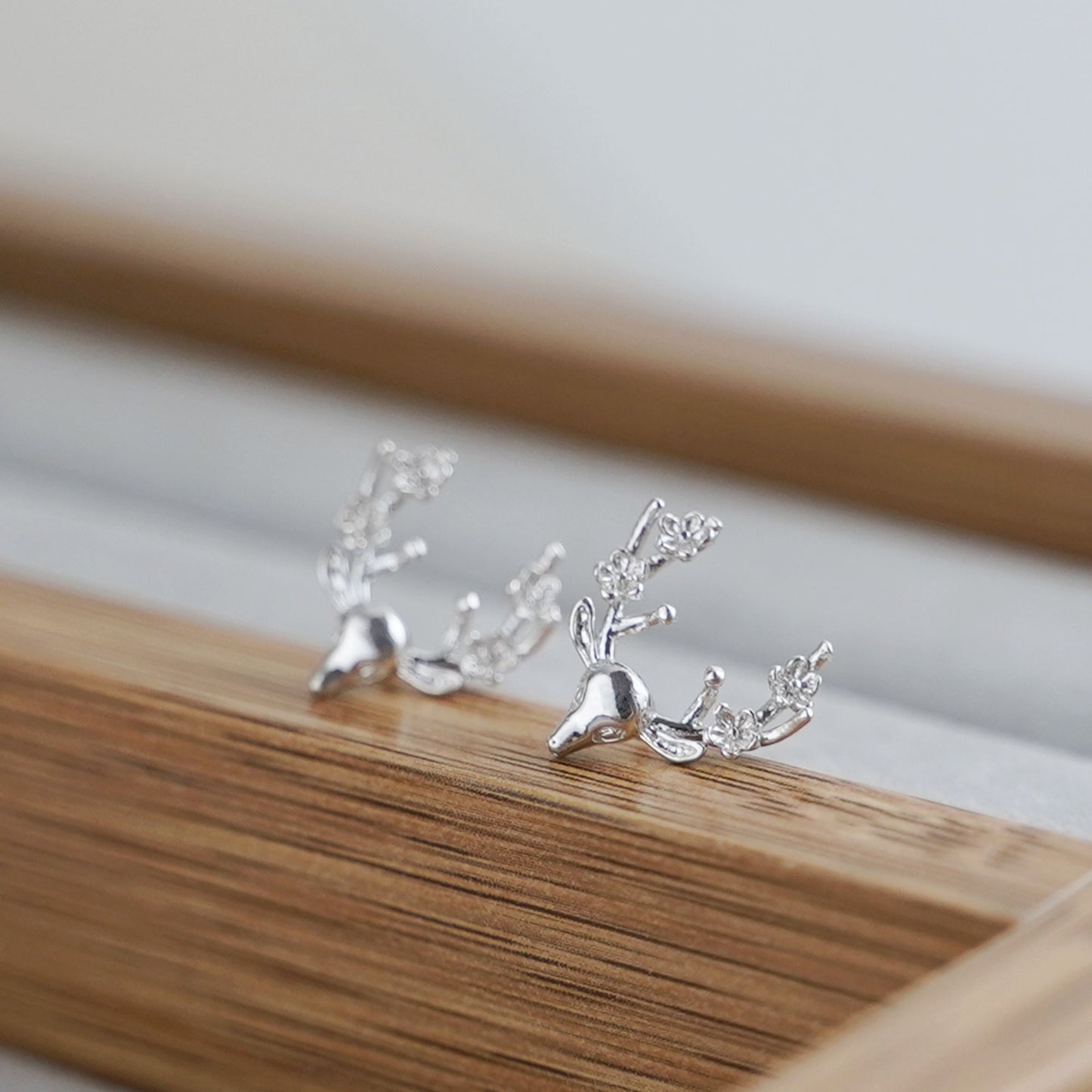 Sterling Silver Shiny Deer Head With Floral Antler Stud Earrings - sugarkittenlondon