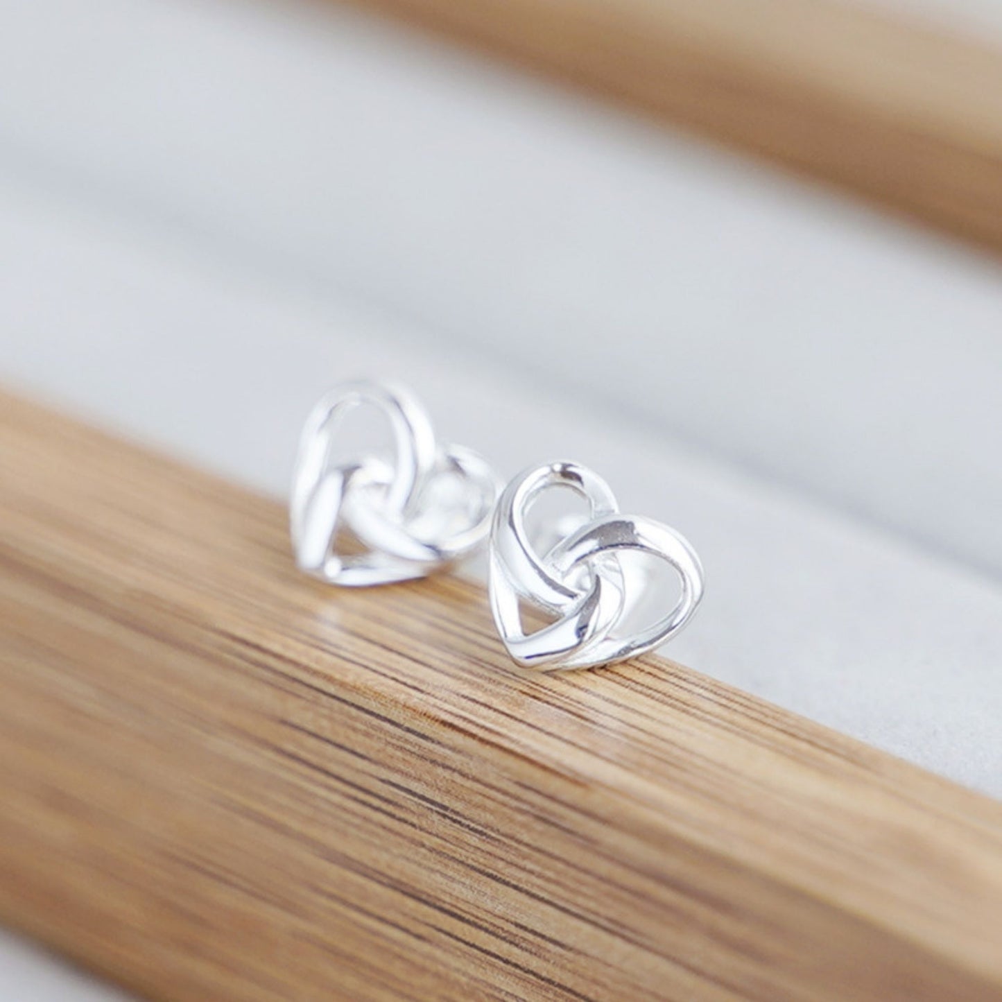 Sterling Silver Twisted Love Knot Heart Stud Earrings - sugarkittenlondon