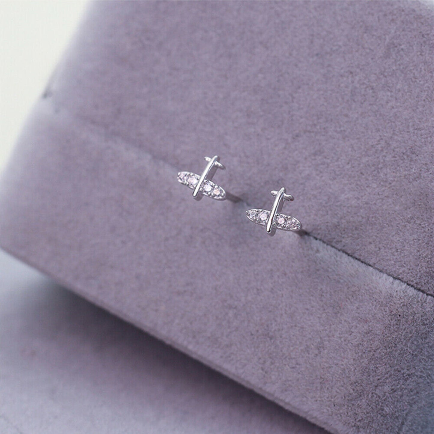Mini CZ Airplane Stud Earrings in Sterling Silver with Rhodium Plating