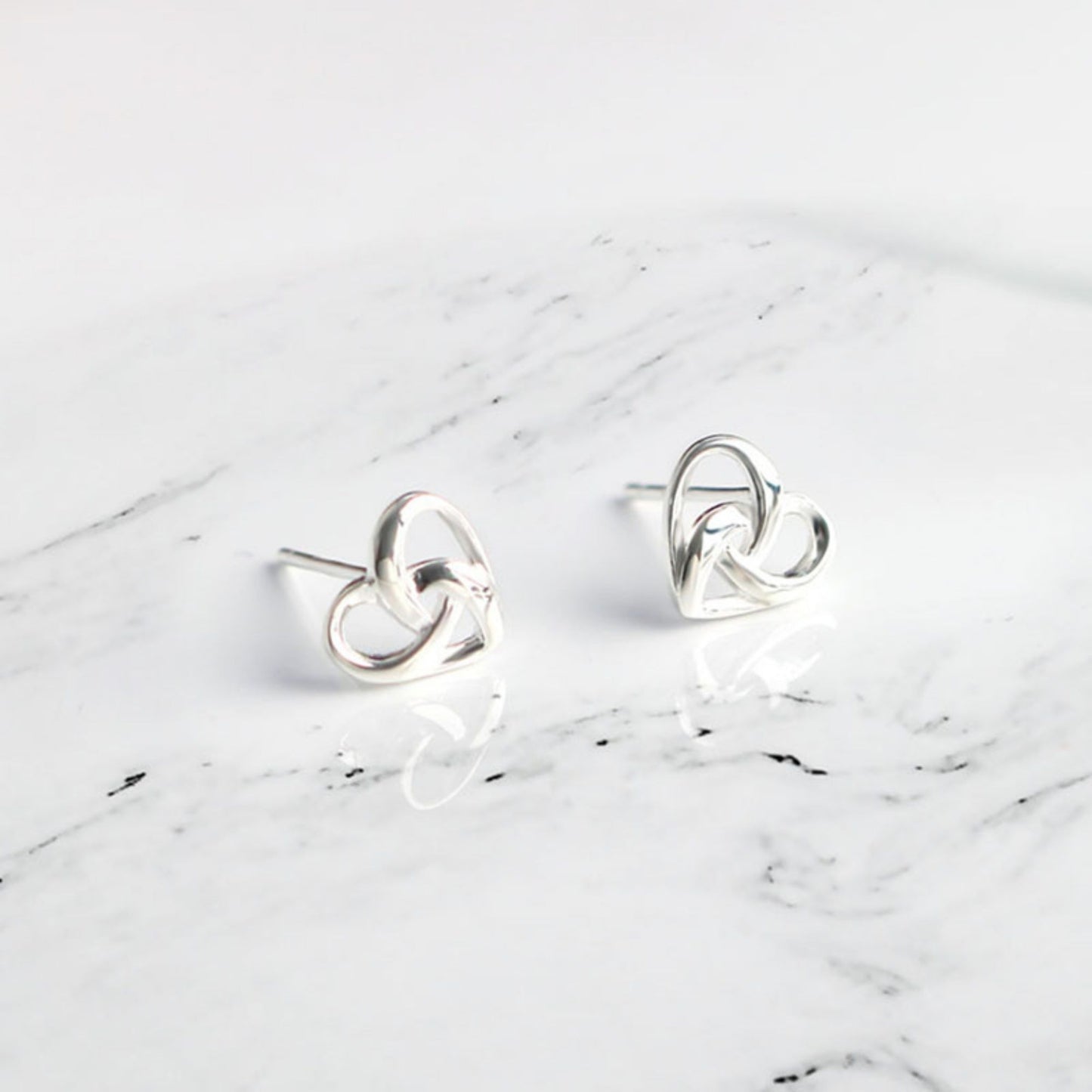 Sterling Silver Twisted Love Knot Heart Stud Earrings - sugarkittenlondon
