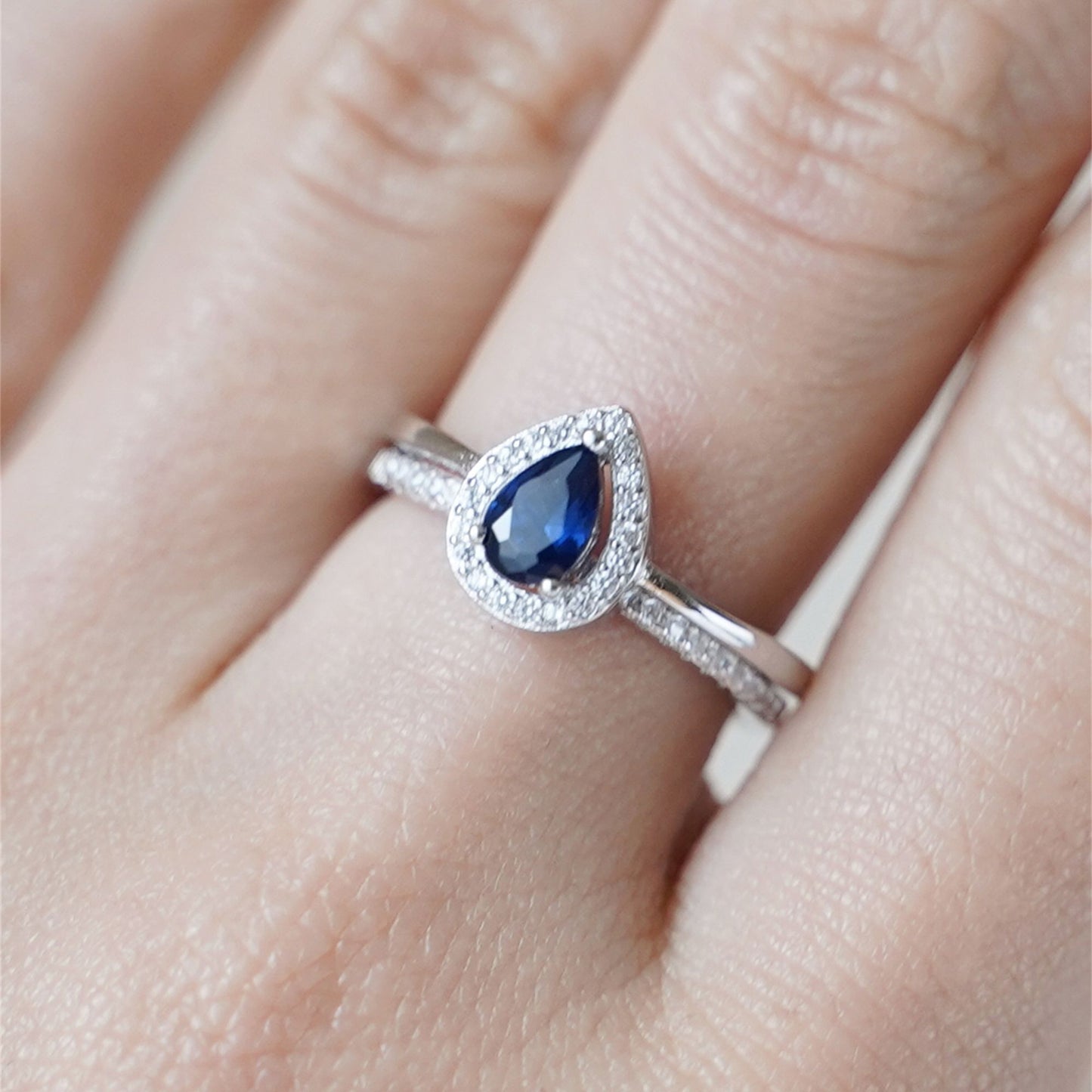 Rhodium on Sterling Silver Teardrop Cut Blue Sapphire Paved CZ Halo Sizable Ring - sugarkittenlondon