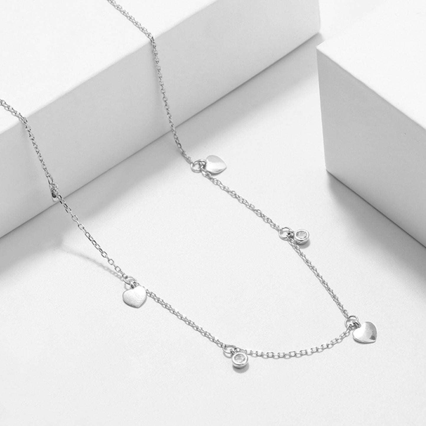 Rhodium on Sterling Silver Mini Love Heart Bezel CZ Charms Drip Choker Necklace - sugarkittenlondon
