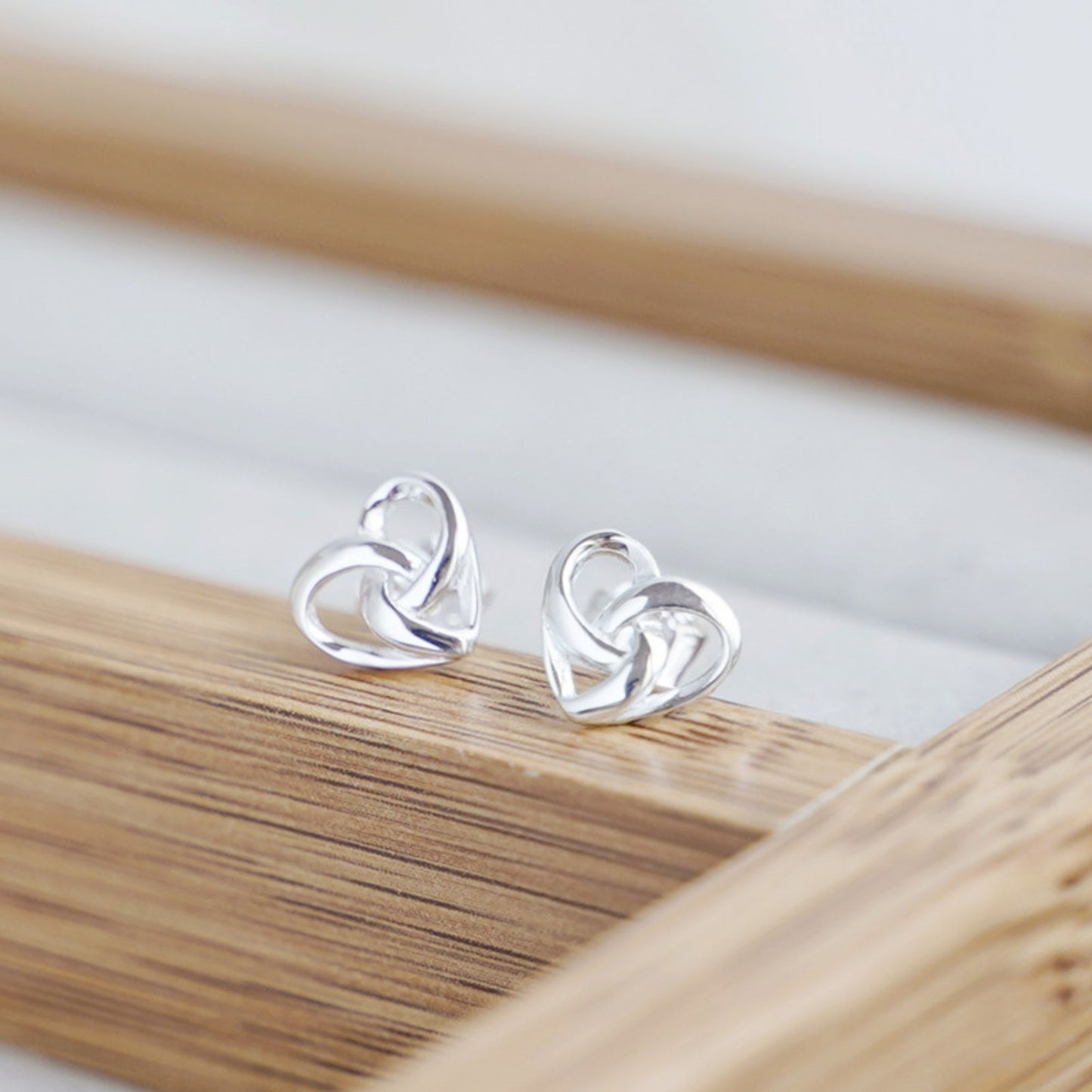 Sterling Silver Twisted Love Knot Heart Stud Earrings - sugarkittenlondon