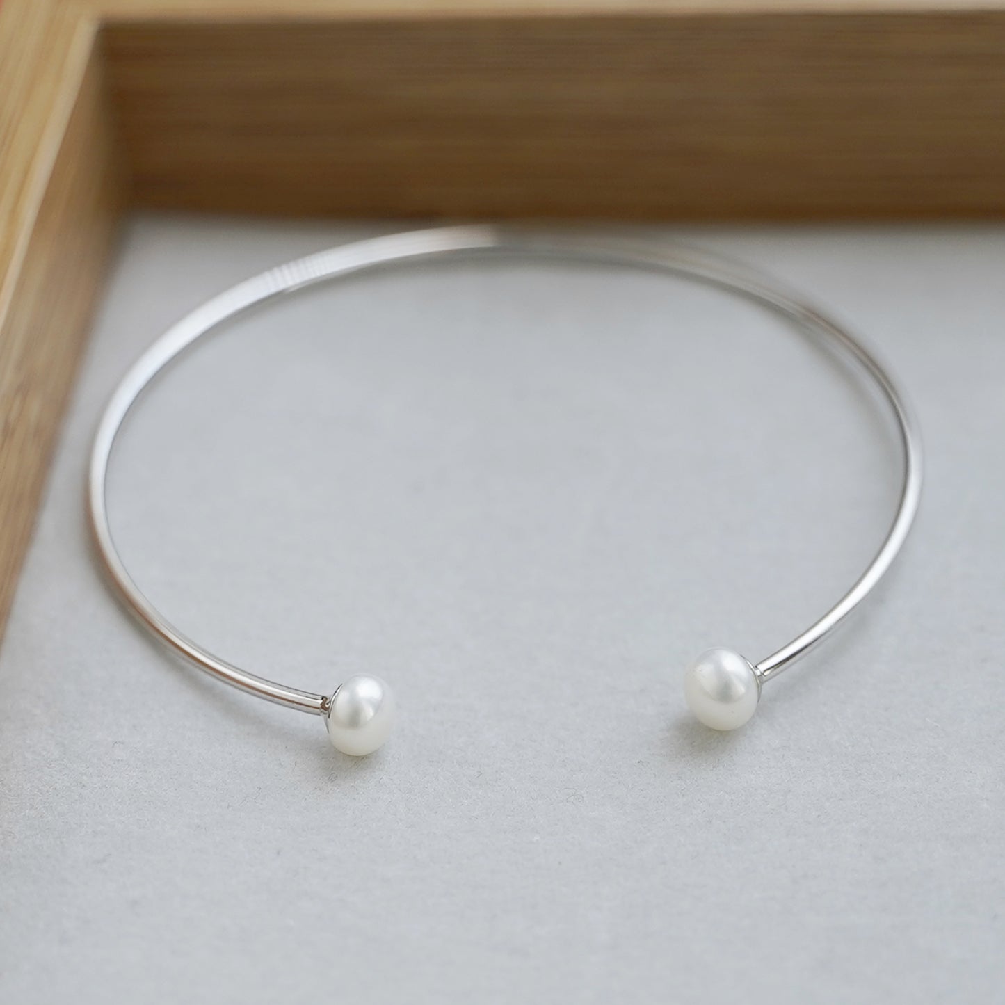 Sterling Silver 6mm Button Natural Freshwater Pearl Solid Wire Bangle 55 by 63mm - sugarkittenlondon