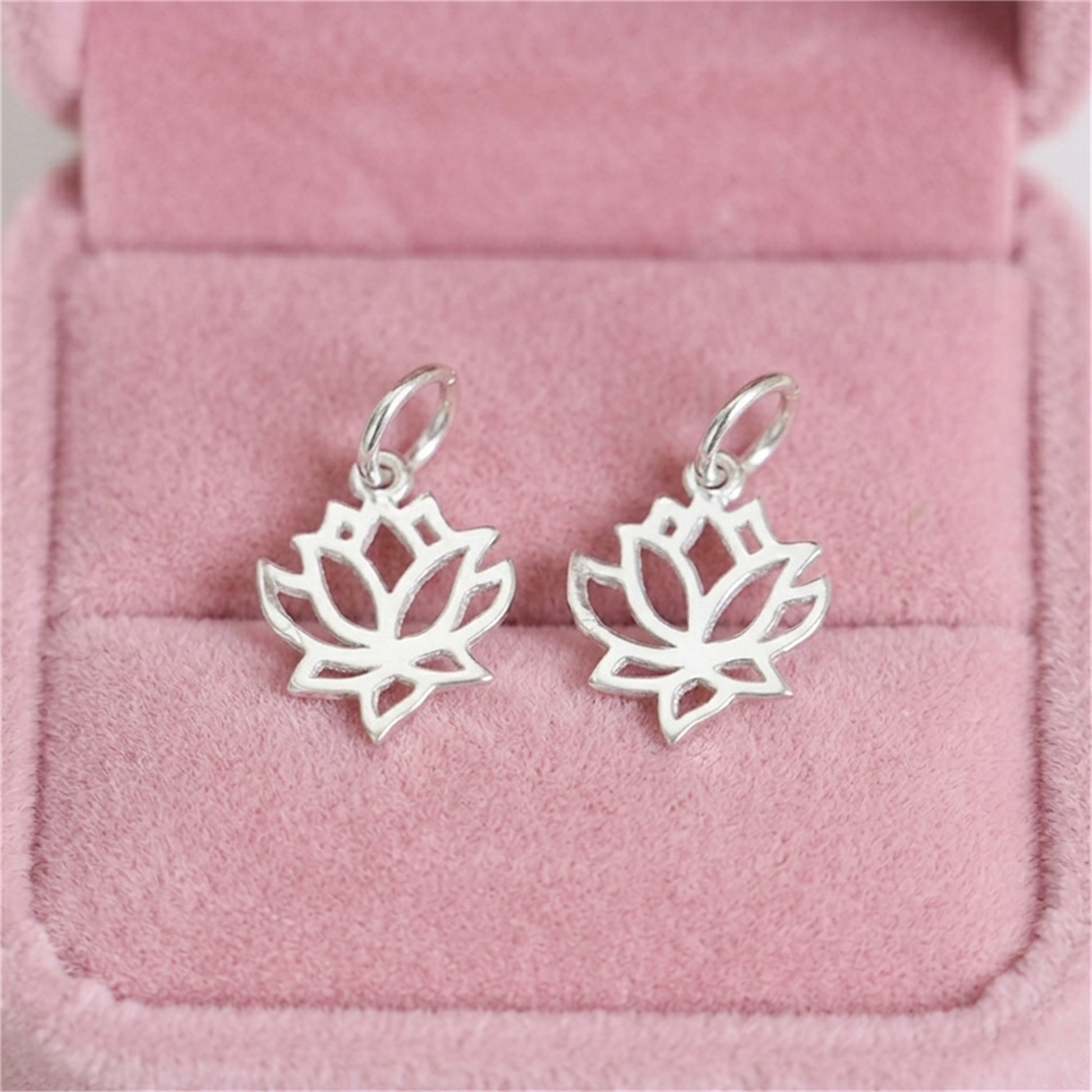 Silver filigree lotus charm earrings, two dangling lotus flower charms