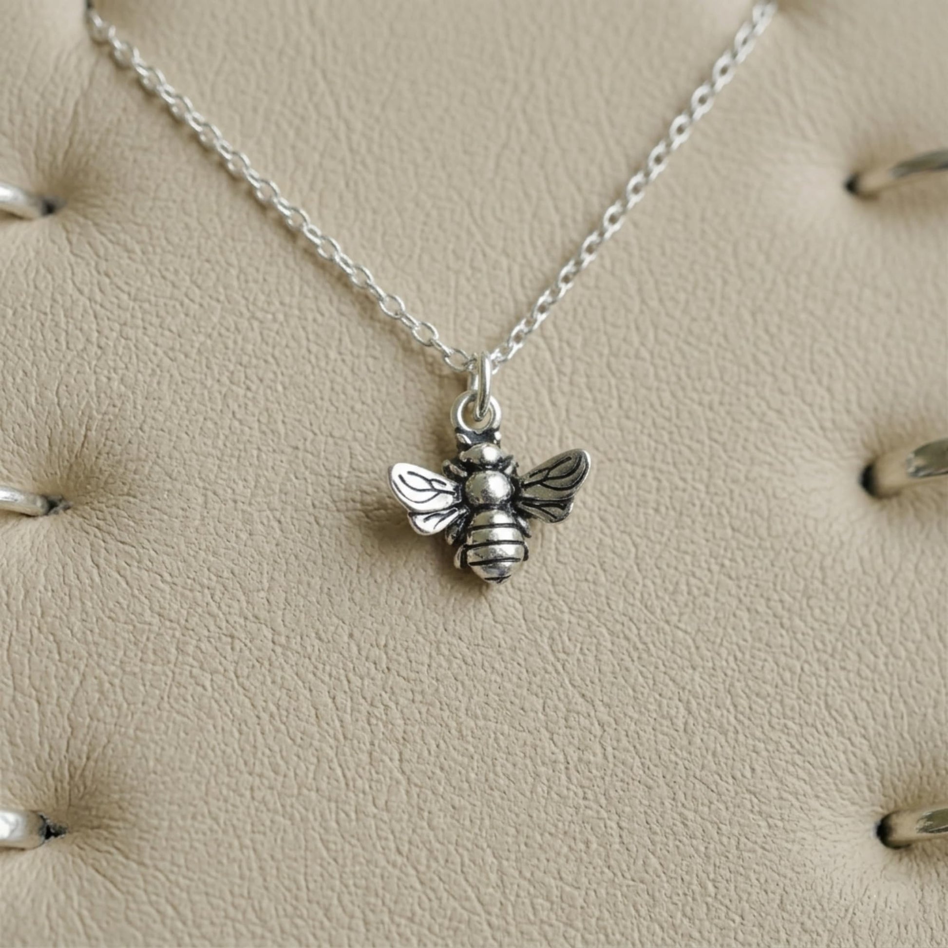 Bumble bee charm pendant on chain, silver-toned winged bee with bail loop