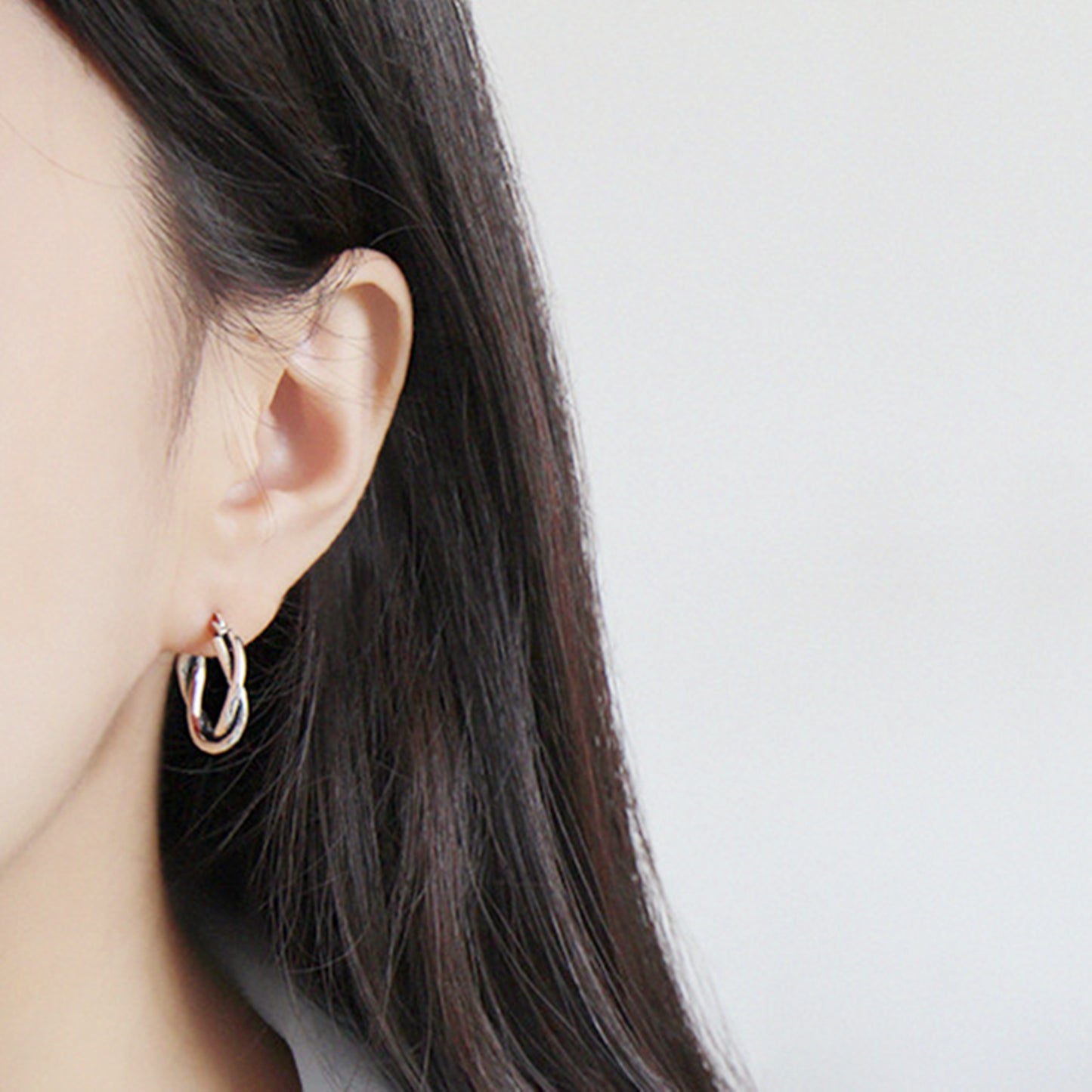 19mm Sterling Silver Oxidized Twist Hoop Earrings with Knot Detail - sugarkittenlondon