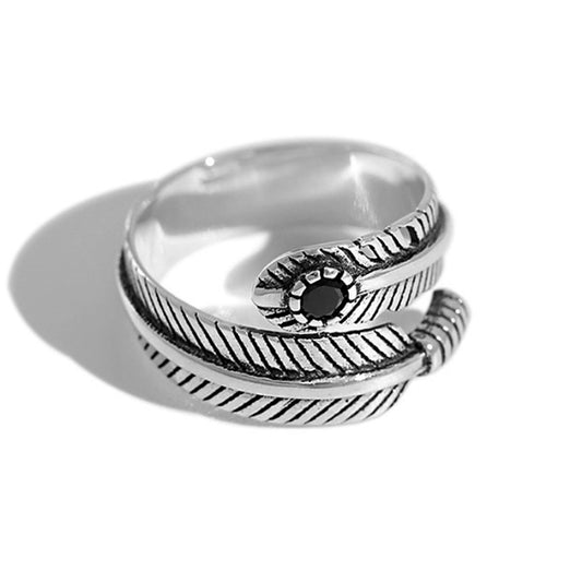 Oxidised feather wrap ring with black CZ center and raised feather details