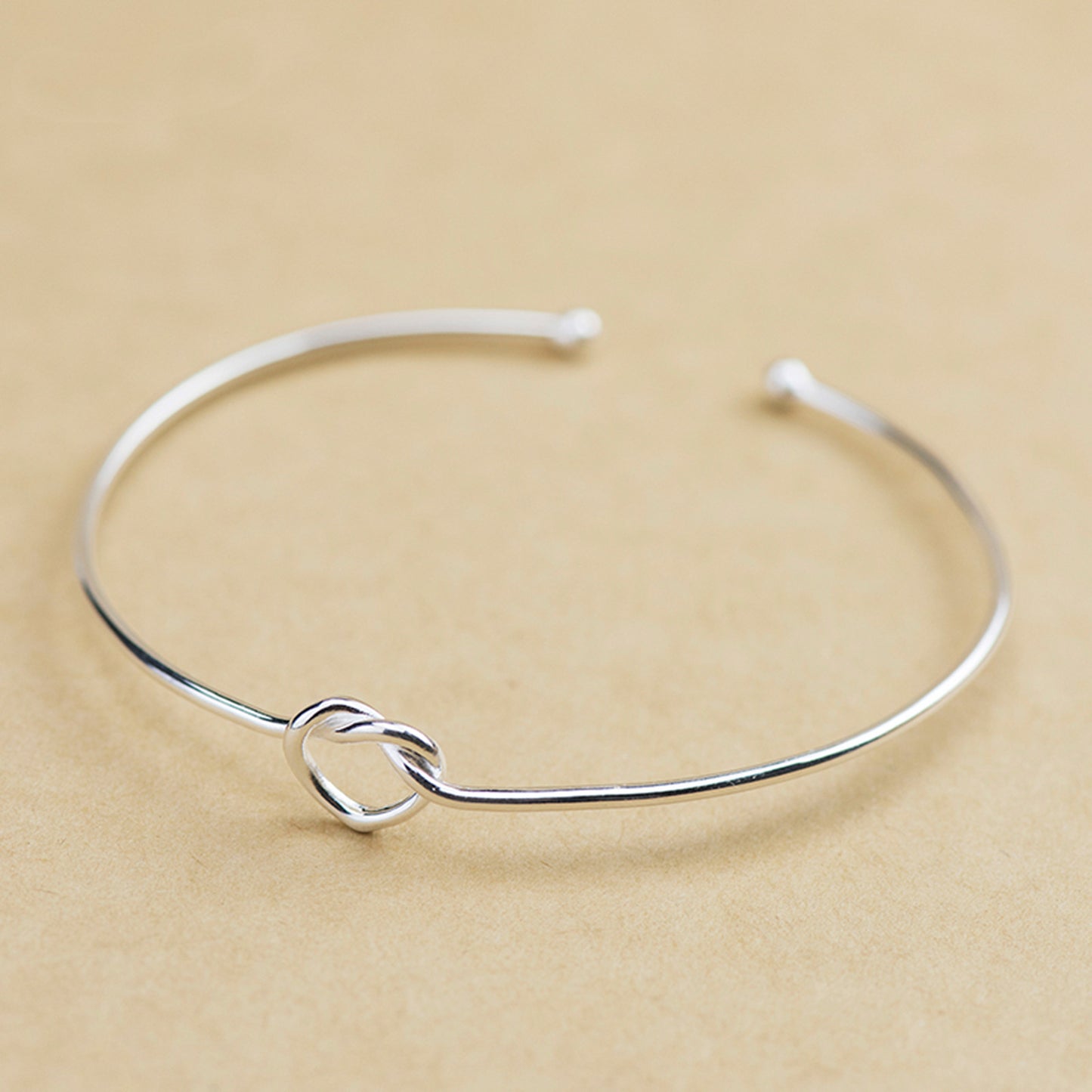 Love Knot Bangle Bracelet in Sterling Silver, 50 x 60mm | Adjustable bracelet - sugarkittenlondon