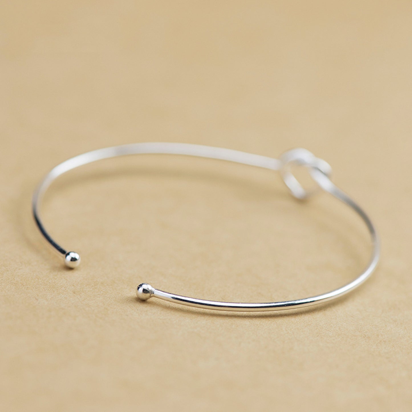 Love Knot Bangle Bracelet in Sterling Silver, 50 x 60mm | Adjustable bracelet - sugarkittenlondon