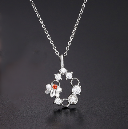 Silver-tone bee honeycomb necklace pendant with hexagon stones on chain