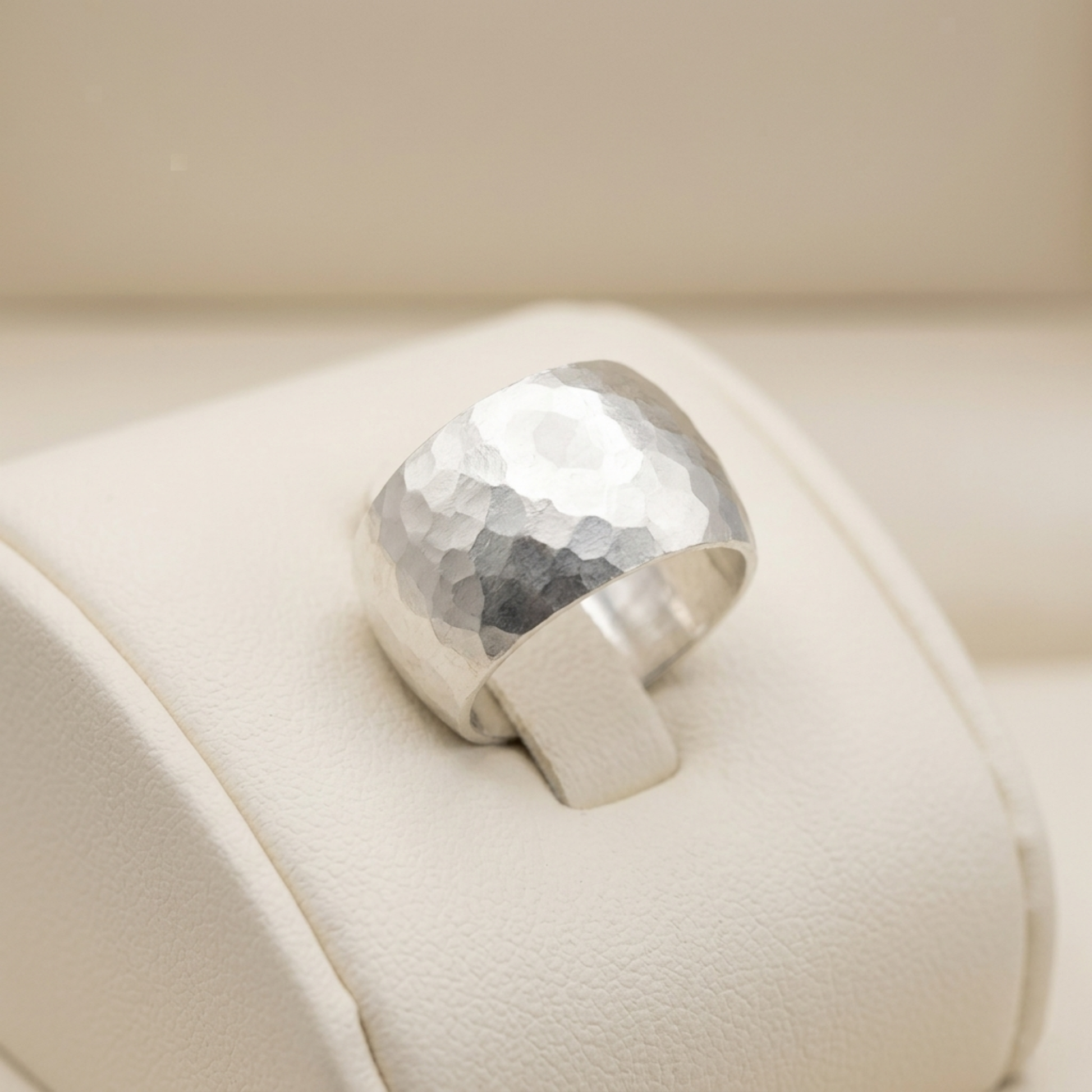 Hammered Wide Dome Ring on a smooth band: hammered dome top, wide silver profile