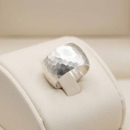 Hammered Wide Dome Ring on a smooth band: hammered dome top, wide silver profile