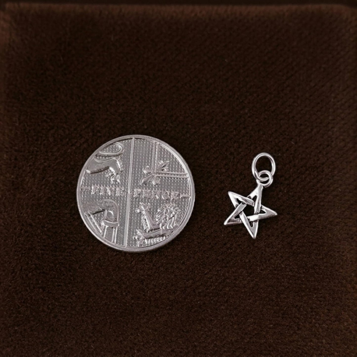 Hollow Lucky Star Charm: crisscross hollow star charm with loop bail