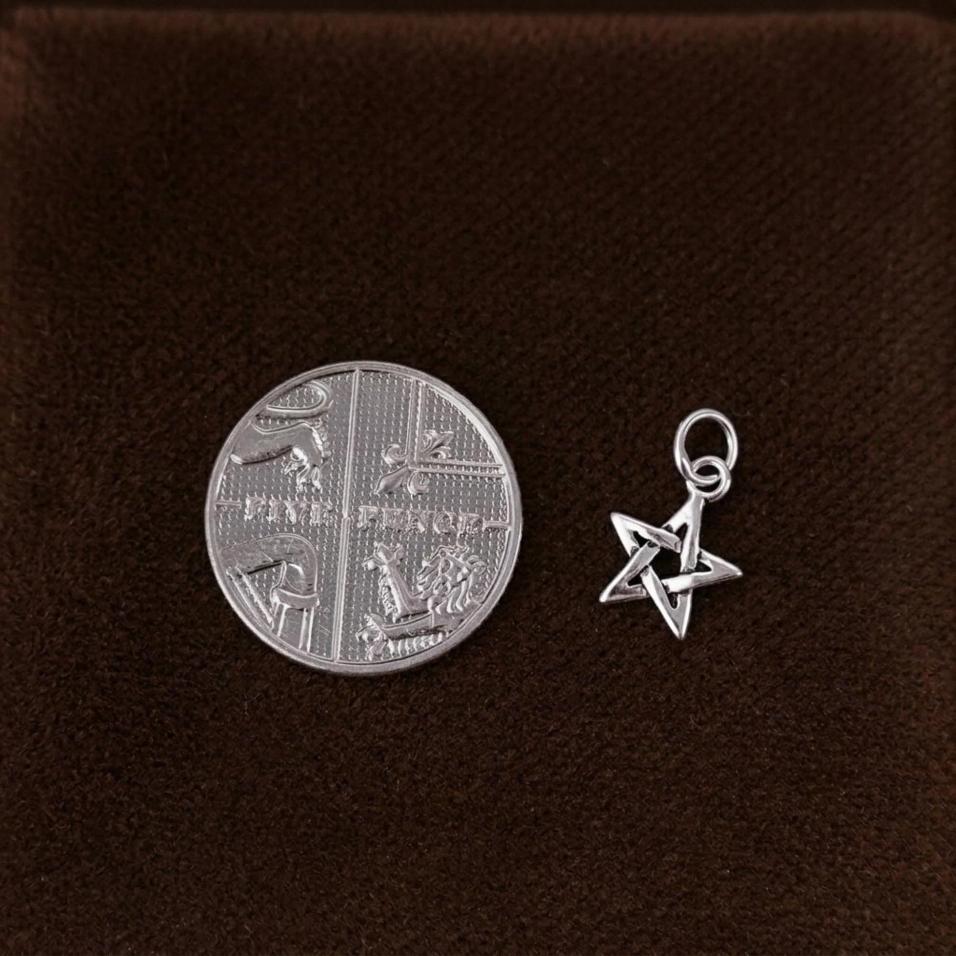 Hollow Lucky Star Charm: crisscross hollow star charm with loop bail