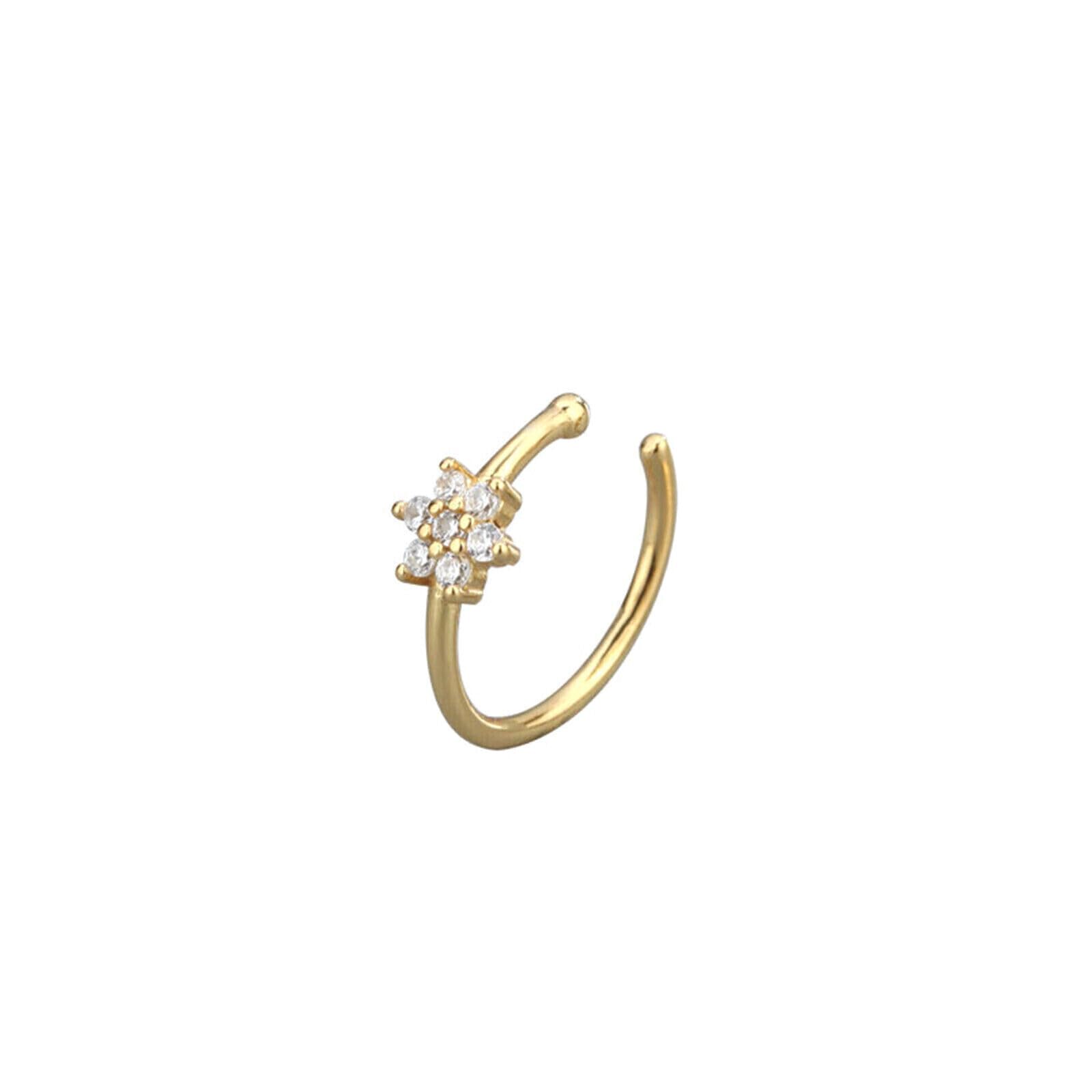 Gold CZ floral cuff hoop earring with a four-stone flower cluster.