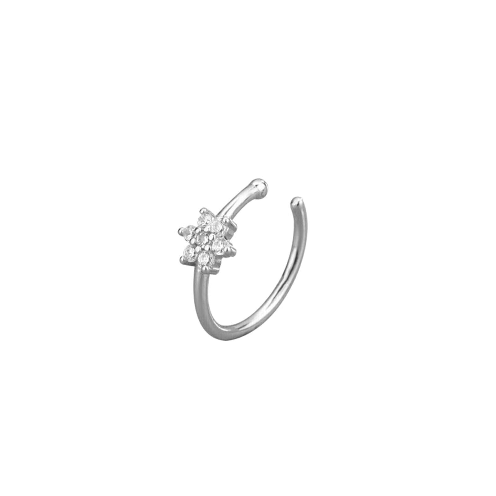 Silver CZ floral cuff hoop earring with a four-stone flower cluster.