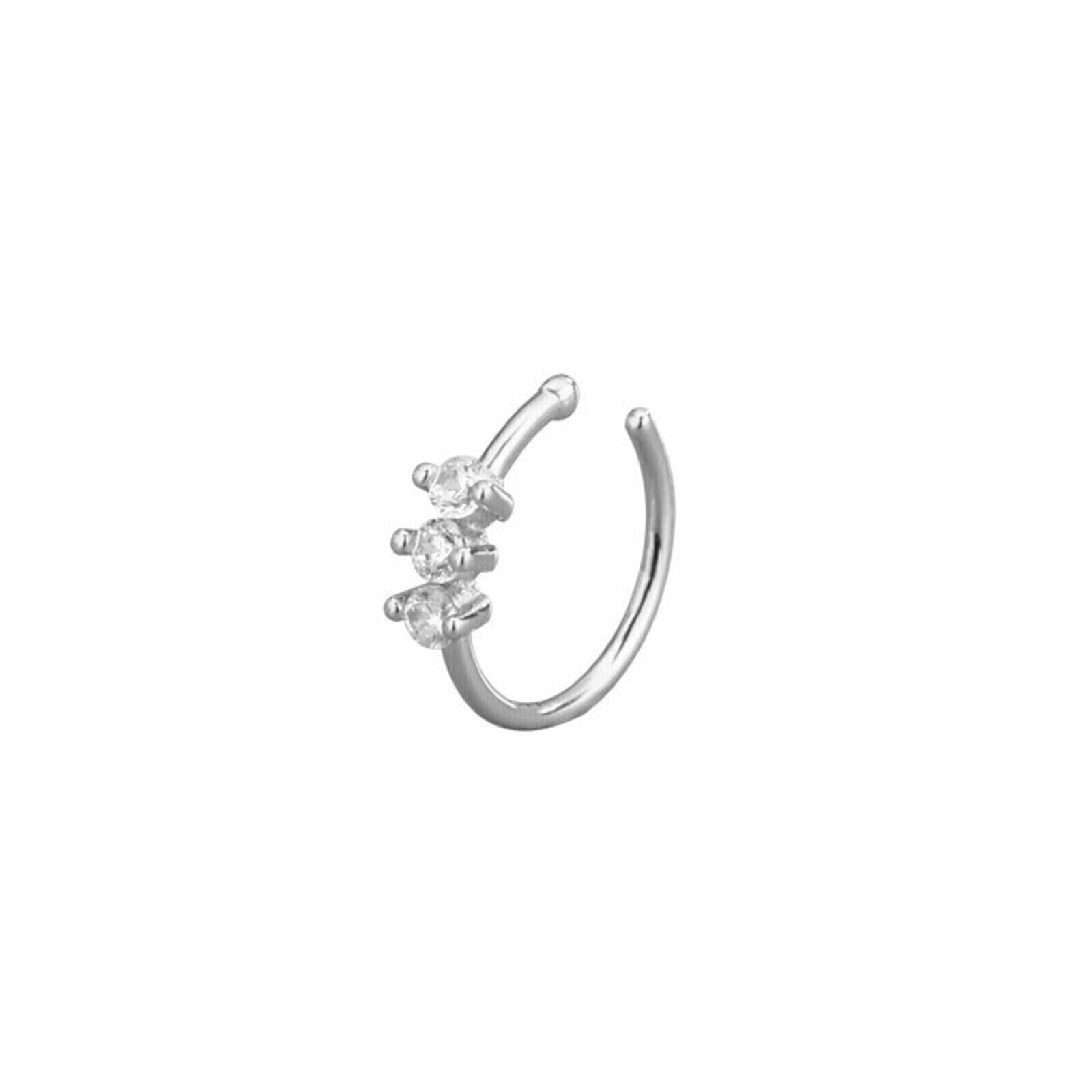 Silver-tone floral CZ cuff hoop earring with three clear stones on a curved band