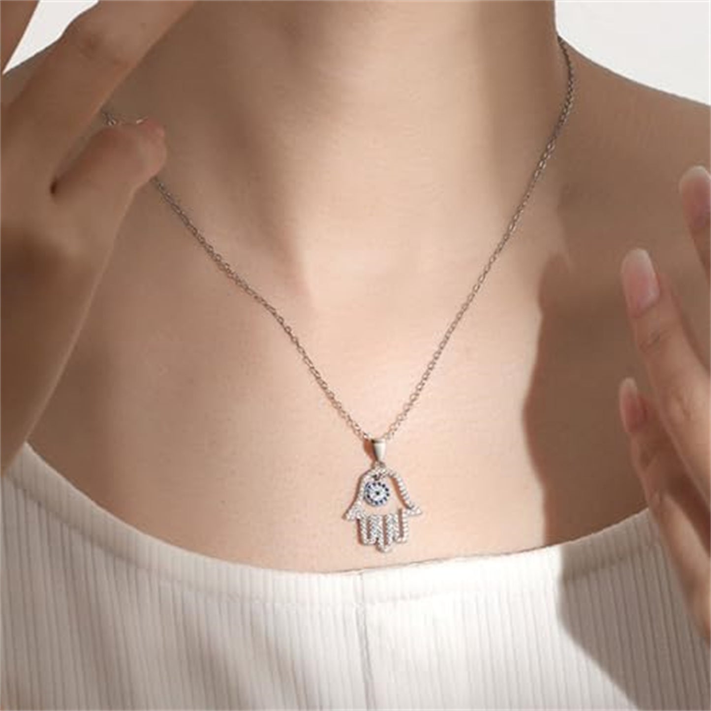 Sterling Silver Hollow Blue Paved CZ Evil Eye Hamsa Hand of Fatima Pendant