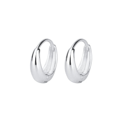 Silver teardrop hoop huggie earrings with a small rounded top, close-up pair.