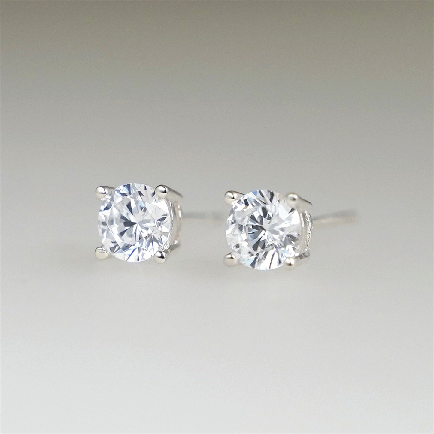 Round CZ solitaire stud earrings, clear round stones with front prong setting
