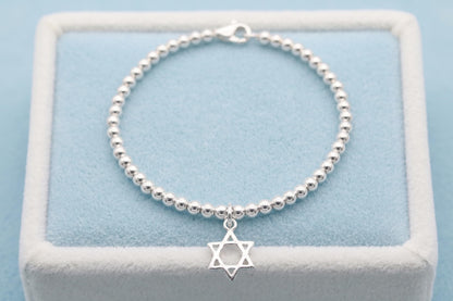 Beaded bracelet with Star of David hollow charm pendant, silver-tone