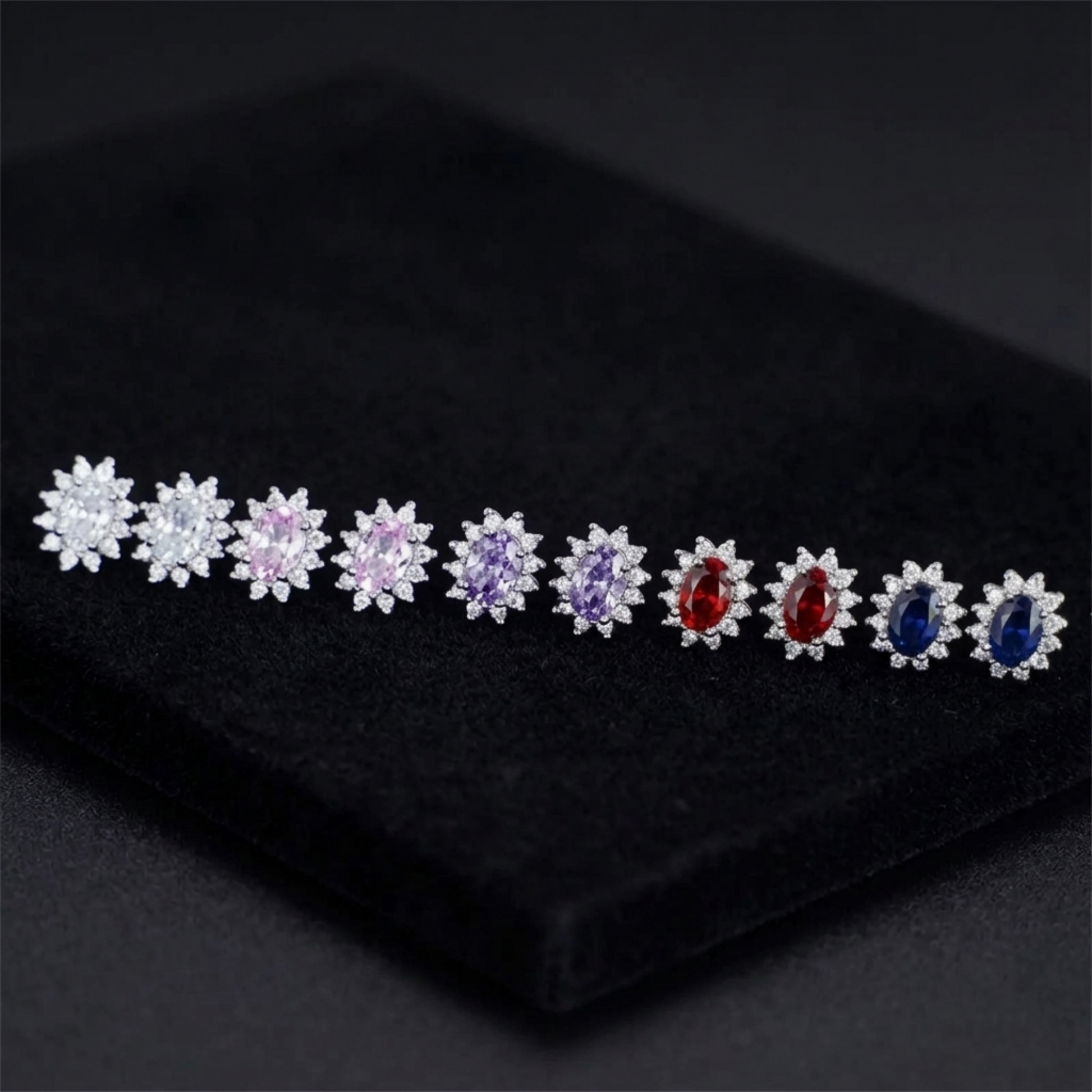 Cluster stud earrings with mixed-color oval gemstones and crystal halos, silver-tone